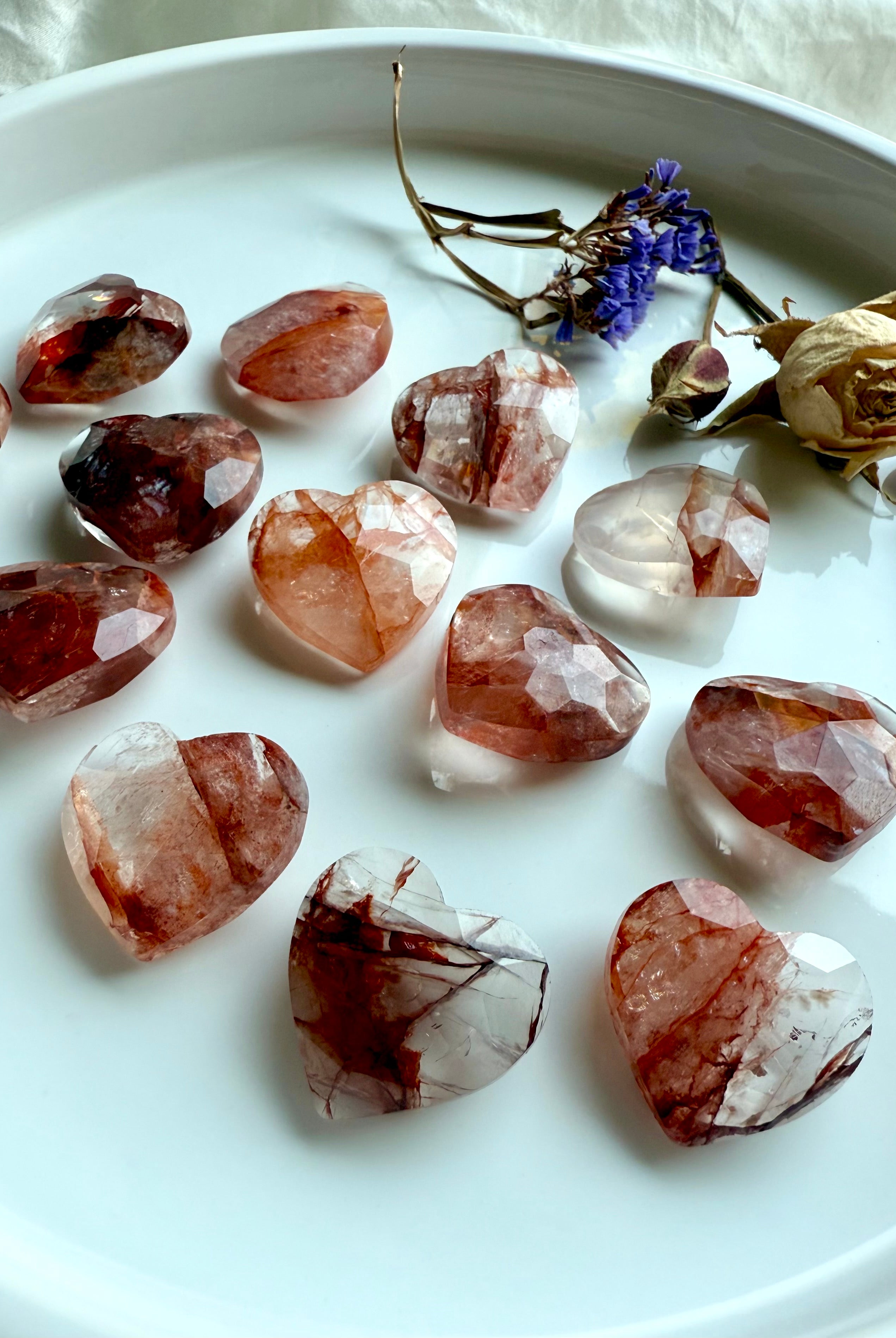 Polished Fire Quartz hearts with sparkling facets – grounding and protective healing crystal