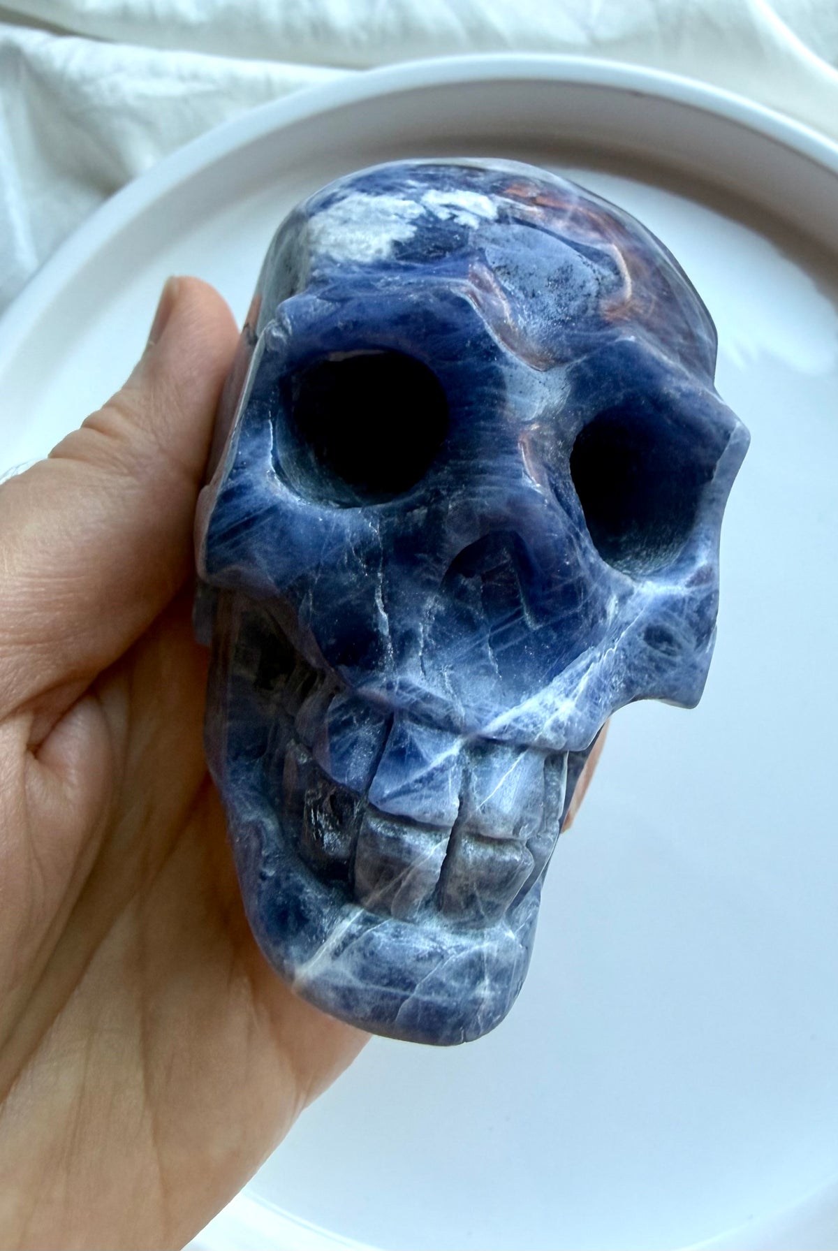 One of a kind Sodalite crystal skull with cobalt and denim blue tones and intricate white veining