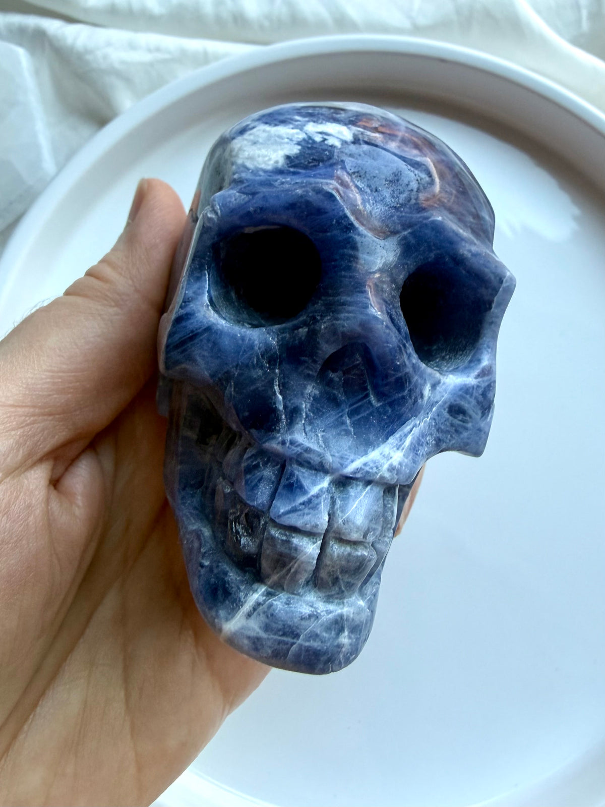 One of a kind Sodalite crystal skull with cobalt and denim blue tones and intricate white veining