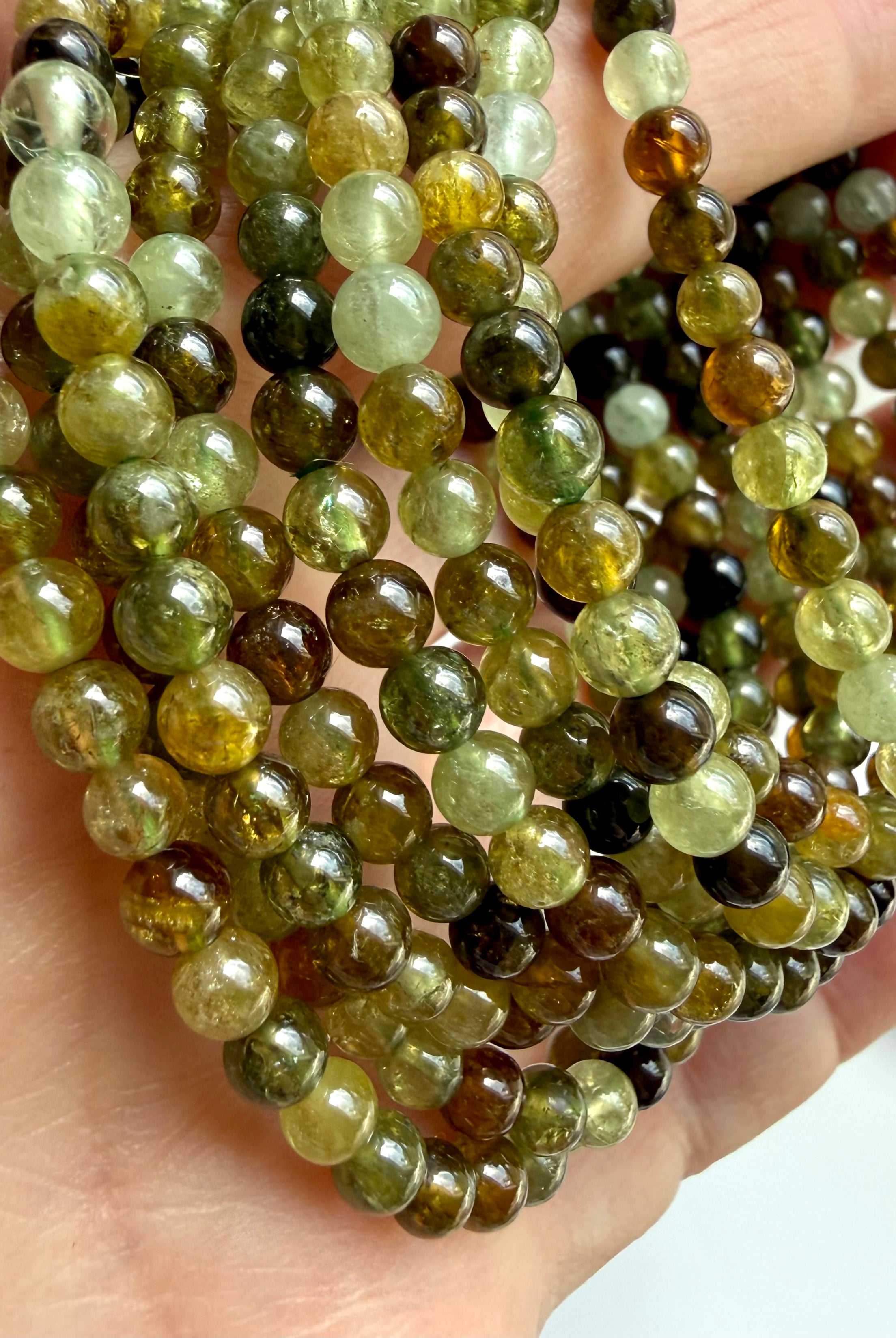 Rare green garnet bracelet stack with natural Tsavorite gemstones in golden green and olive tones