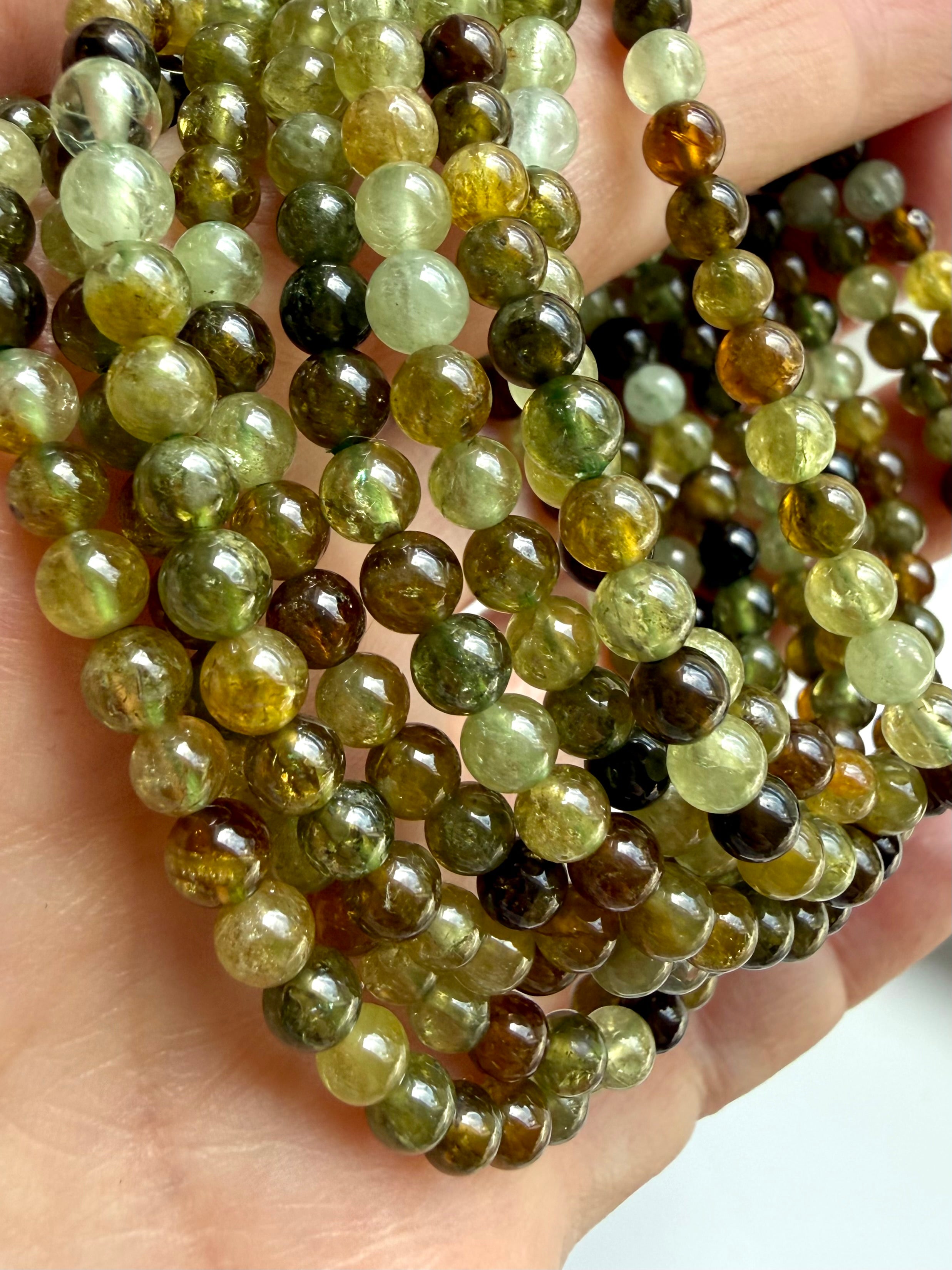 Rare green garnet bracelet stack with natural Tsavorite gemstones in golden green and olive tones