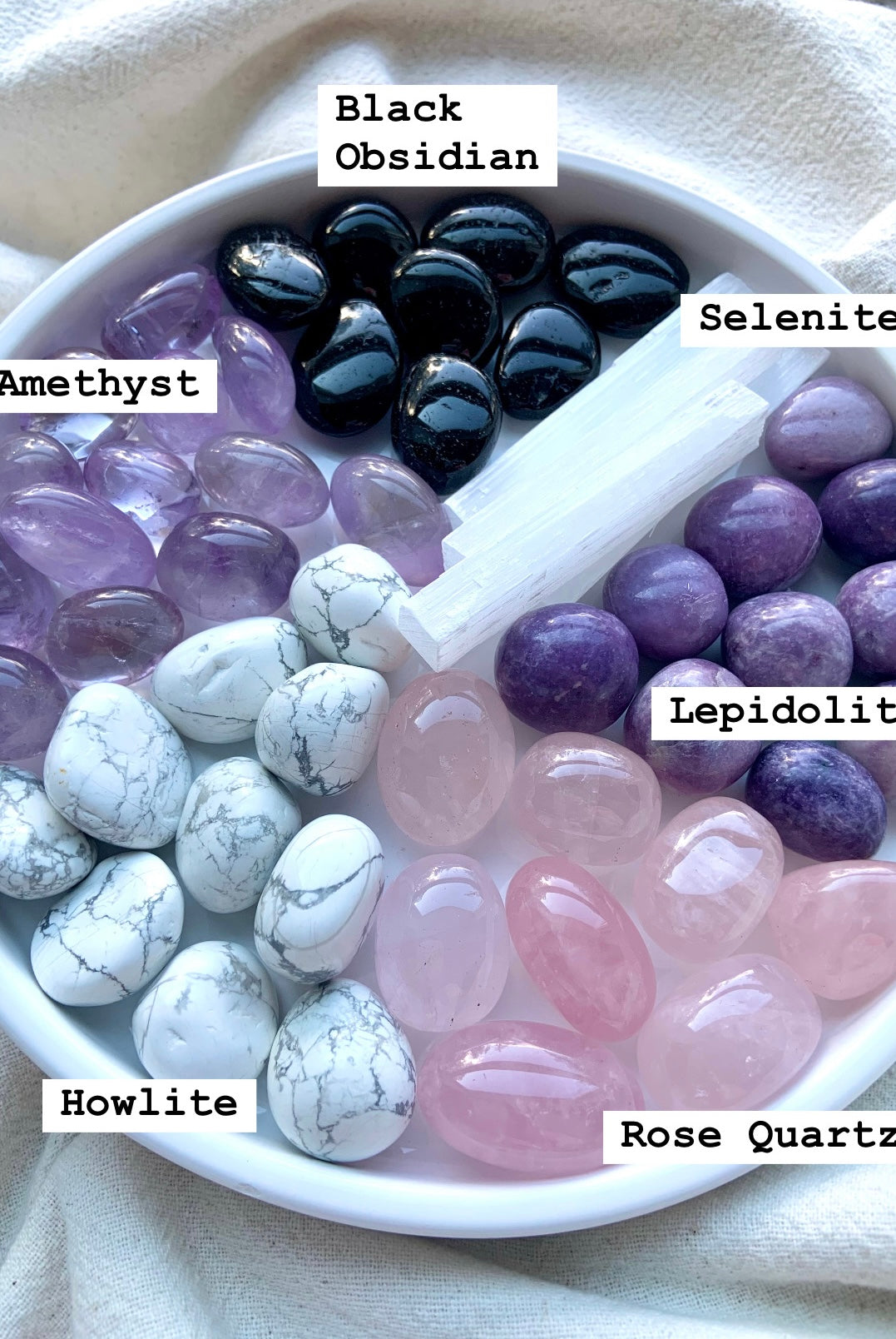 Sleep crystal set stones in a bowl: amethyst, obsidian, rose quartz, howlite, lepidolite, selenite
