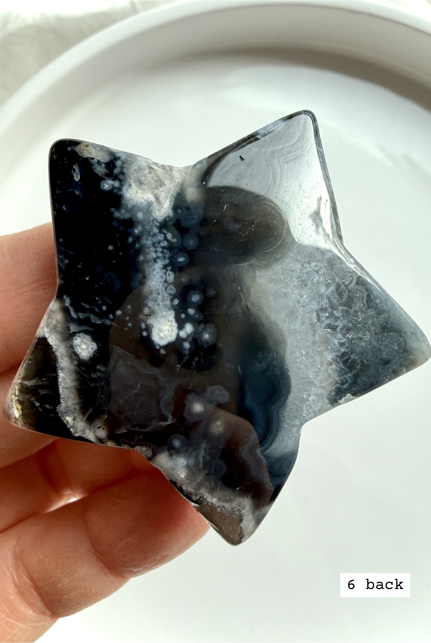 black flower agate star carving #6 back showing layered plume formations and natural stone variation