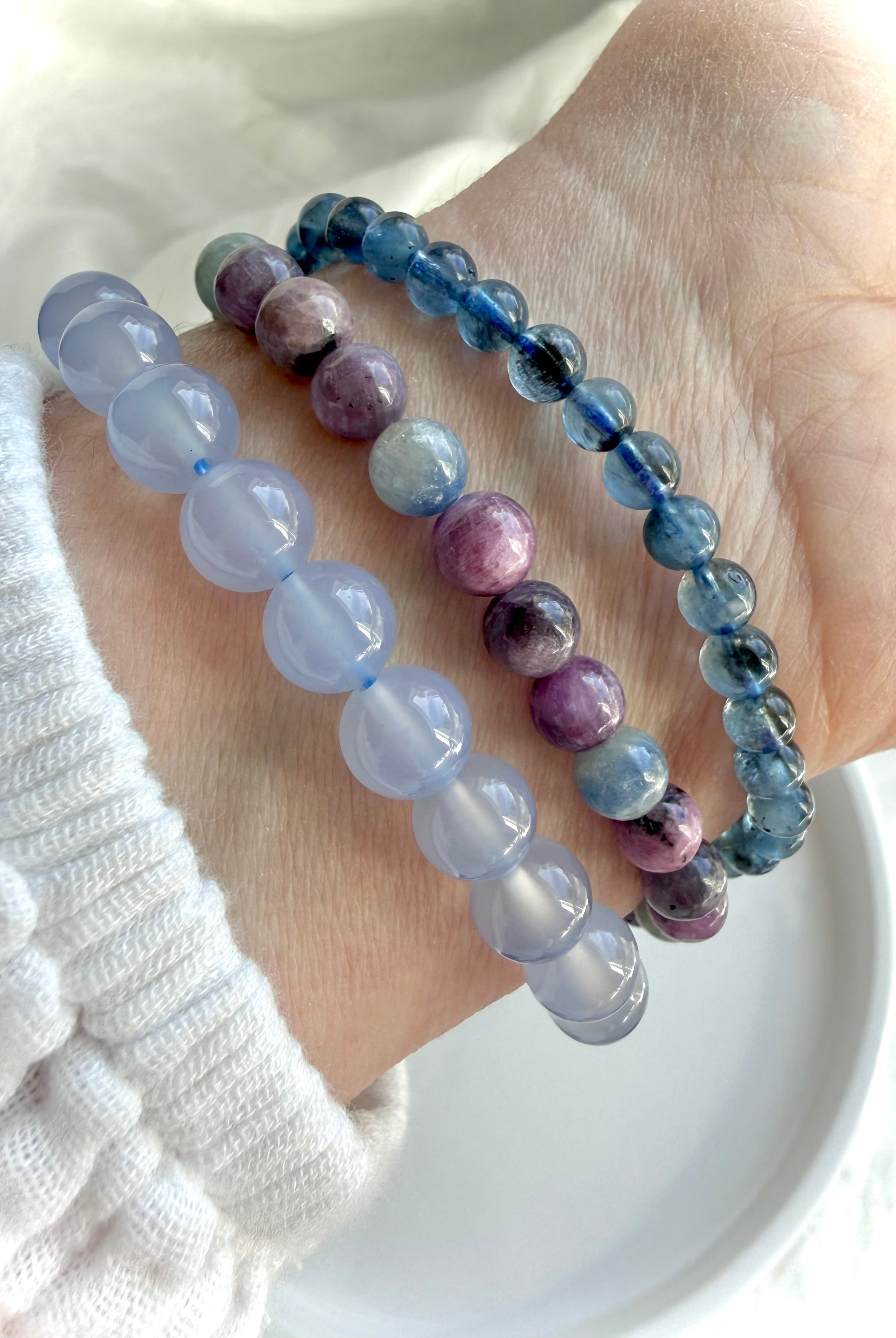 Ruby Sapphire bracelets worn with blue chalcedony & aquamarine crystal bracelets for gemmy stacking ideas