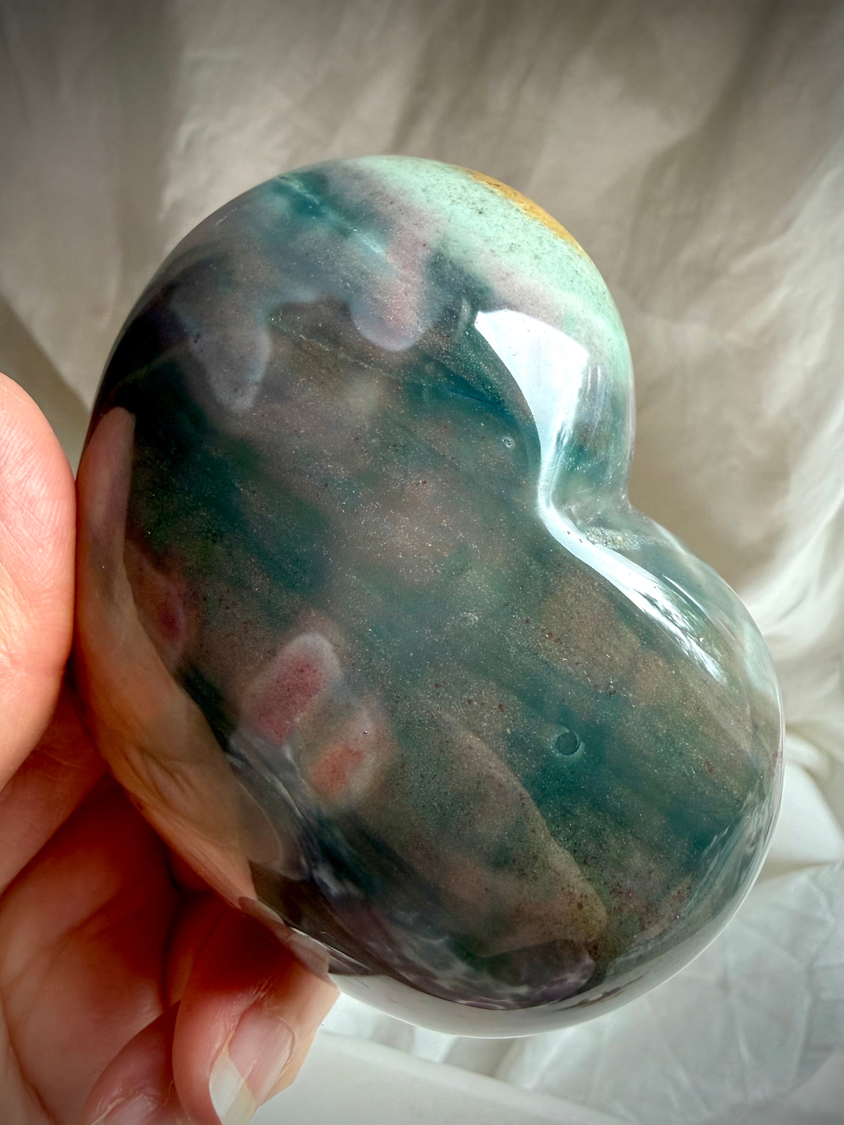 Premium Ocean Jasper heart carving with layered ocean-inspired patterns from Madagascar