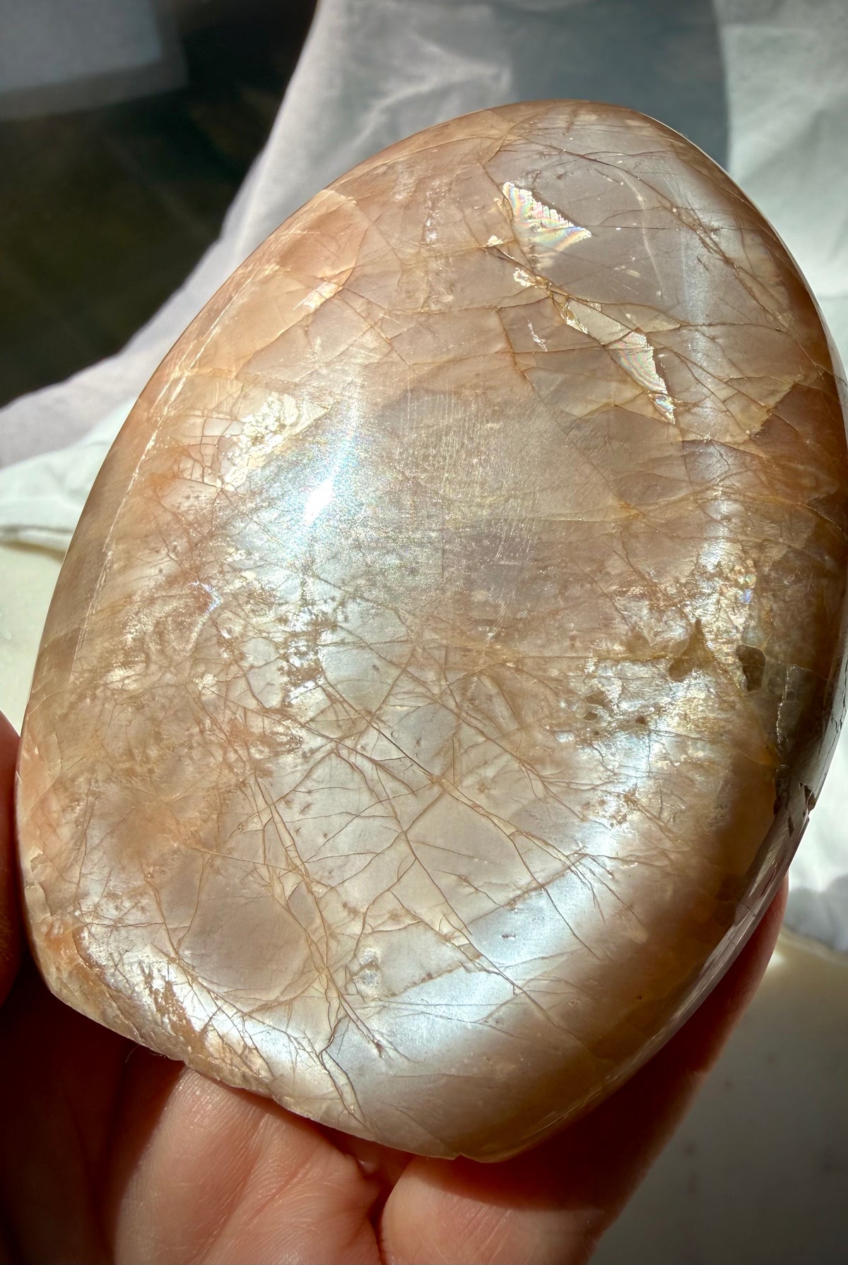 Rainbow Peach Moonstone freeform with silvery shimmer, golden Sunstone sparkle and natural rainbow flashes across the polished surface
