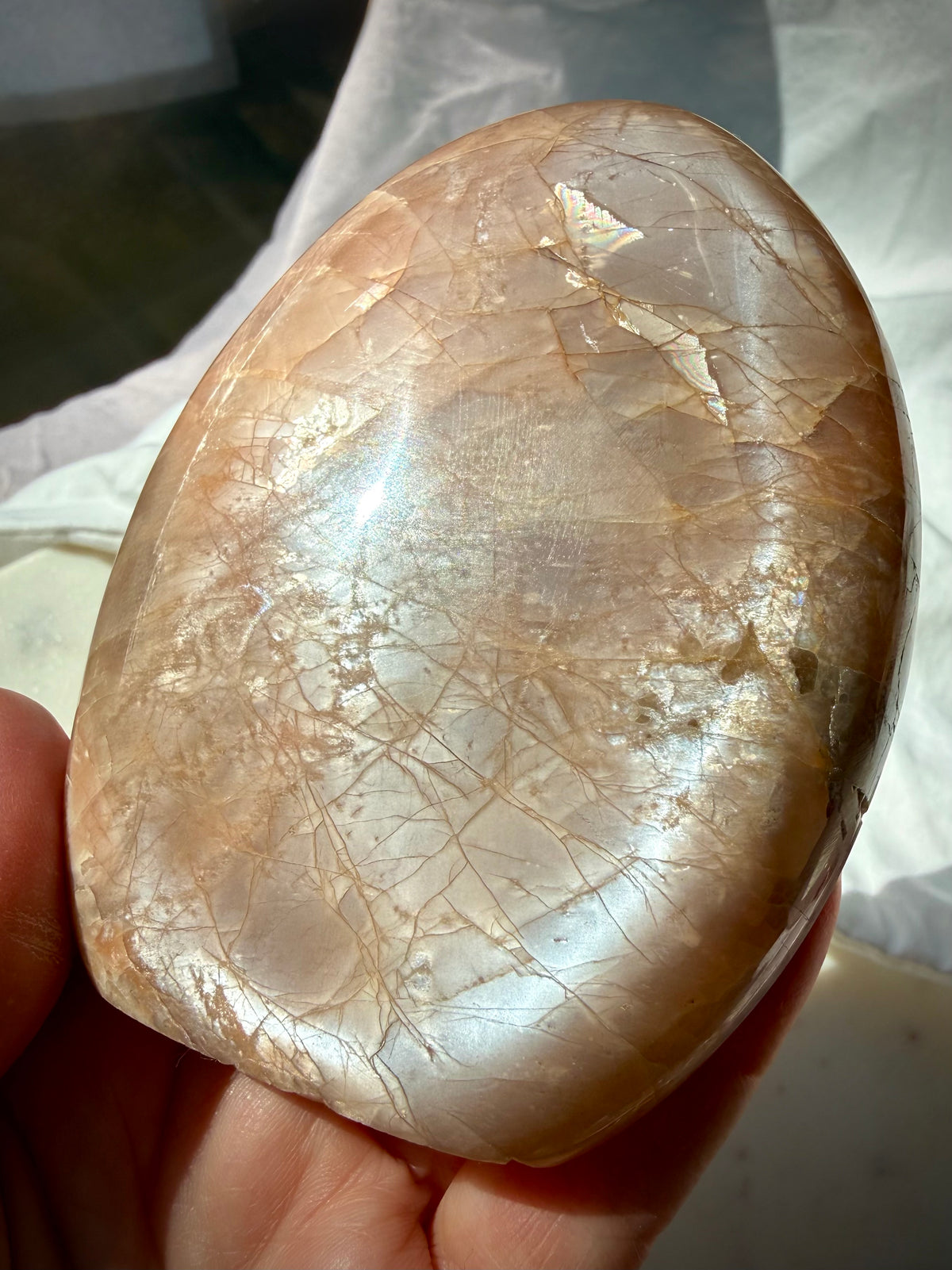 Rainbow Peach Moonstone freeform with silvery shimmer, golden Sunstone sparkle and natural rainbow flashes across the polished surface