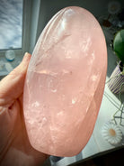 Asteriated Rose Quartz Crystal from Madagascar with flashy rainbows + cats eye asterism in the light