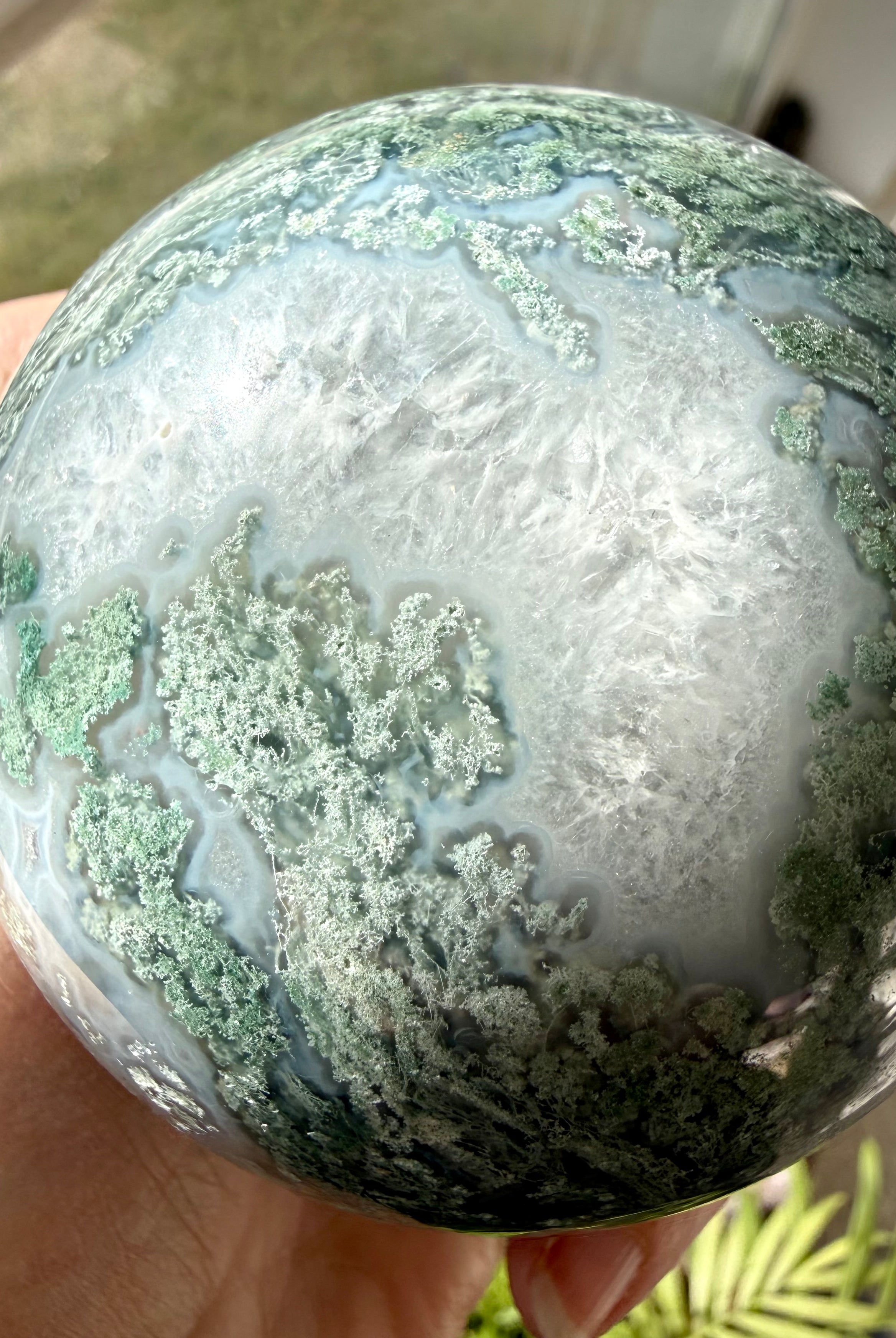 Large Moss Agate crystal sphere with scenic landscape patterns for grounding, abundance, and balance