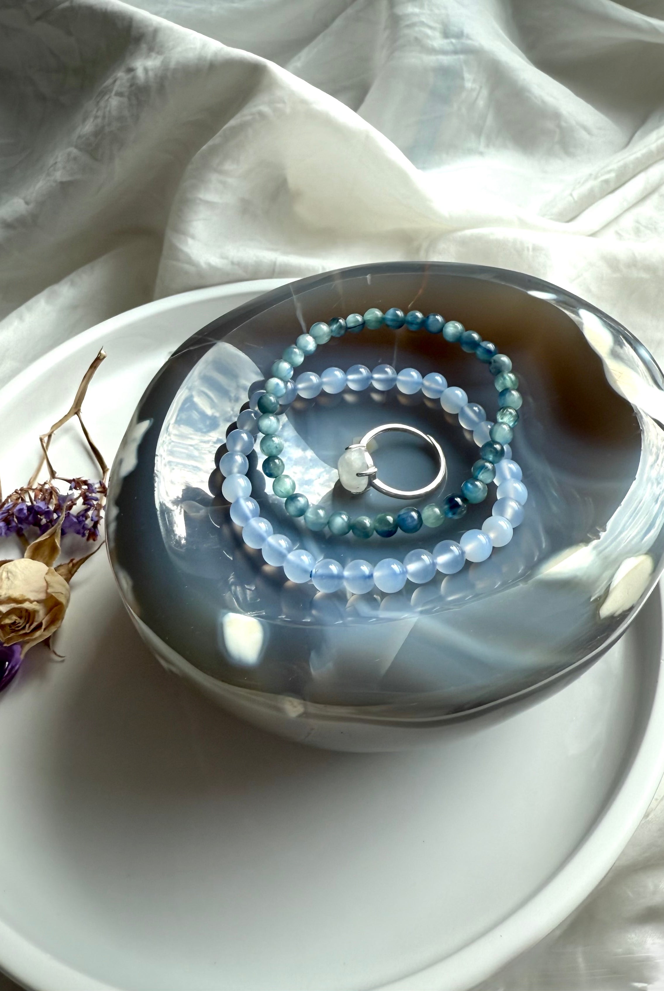 Orca Agate offering bowl with Blue Chalcedony and Kyanite bracelets, and a ring for sacred space decor