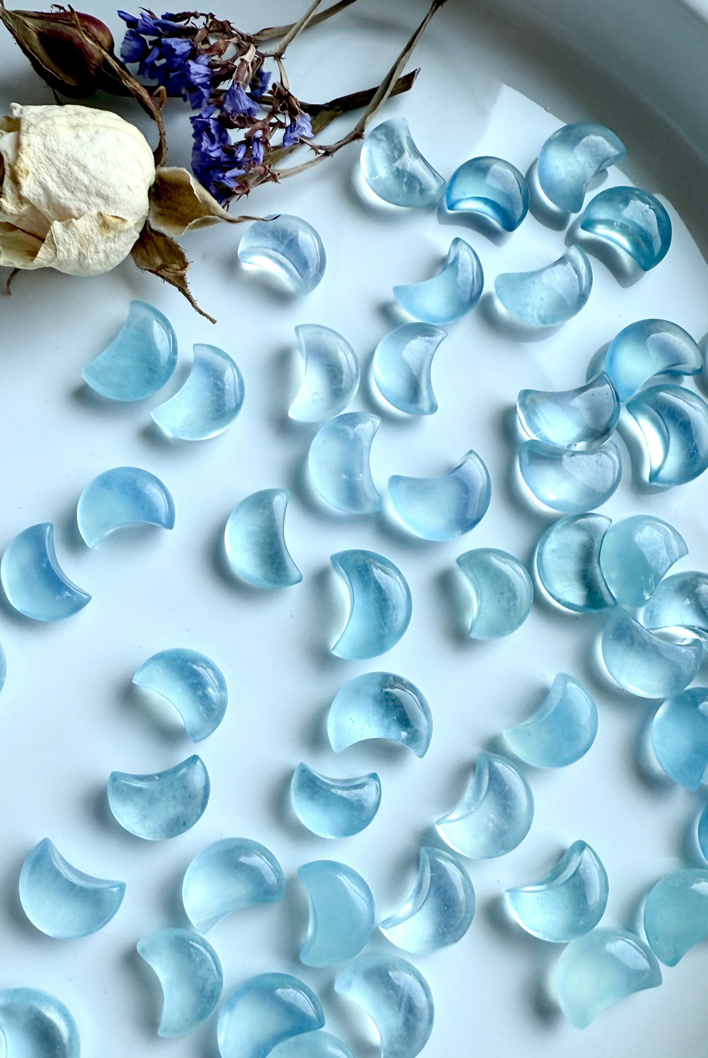 Polished Aquamarine Mini Moons showing high-clarity gemstone detail and color variation — ideal for mini altars and pocket talismans