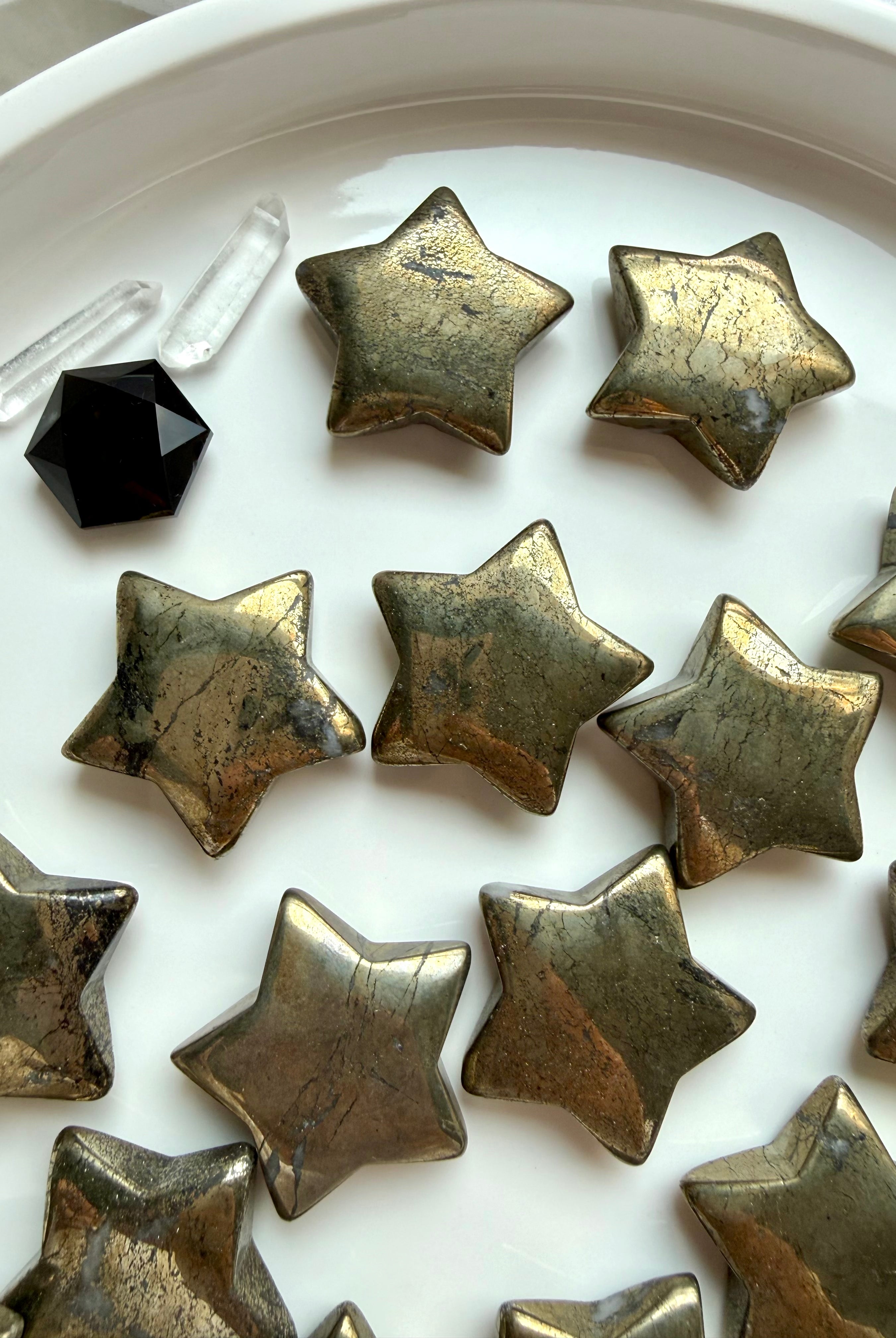 Pyrite stars arranged with Clear Quartz and Black Obsidian crystals for manifestation and energetic protection