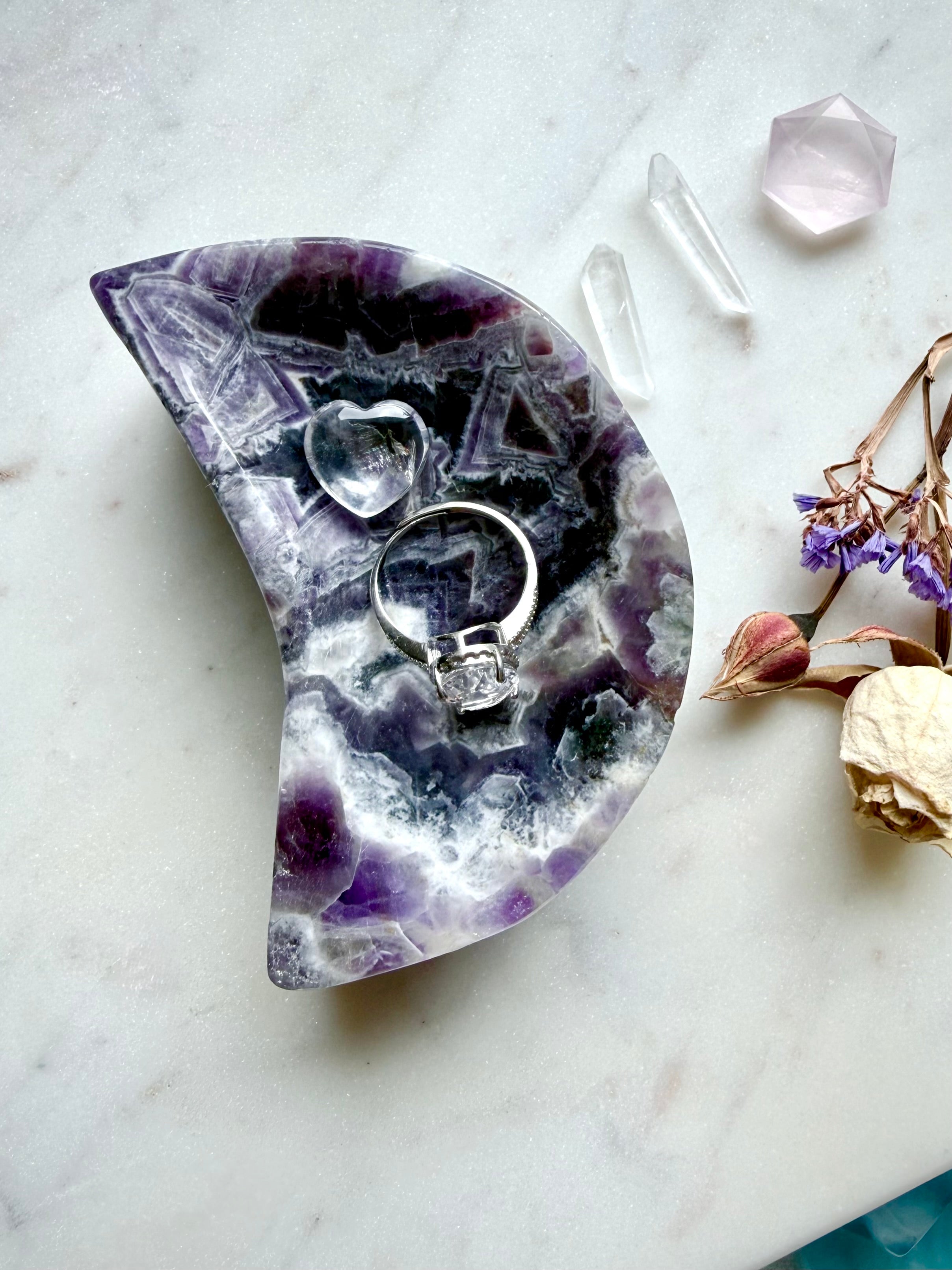 Dream Amethyst moon carving styled with crystals and dried flowers, crescent bowl for spiritual altar use
