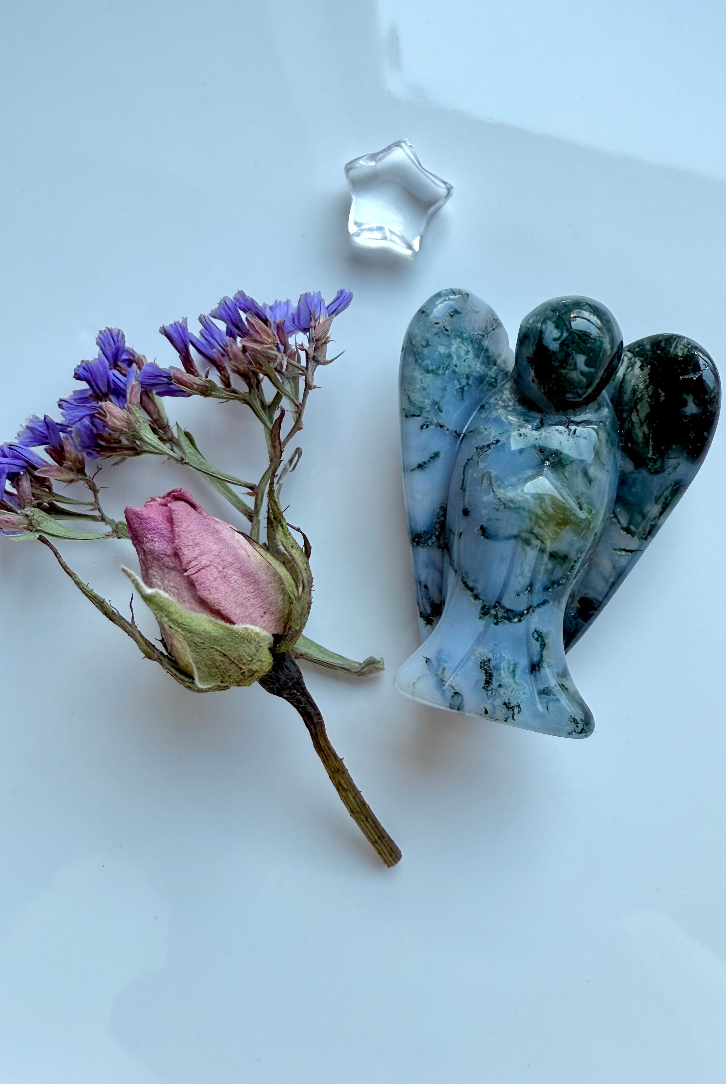Hand-carved Moss Agate angel figurine with Clear Quartz star and dried flower bouquet.