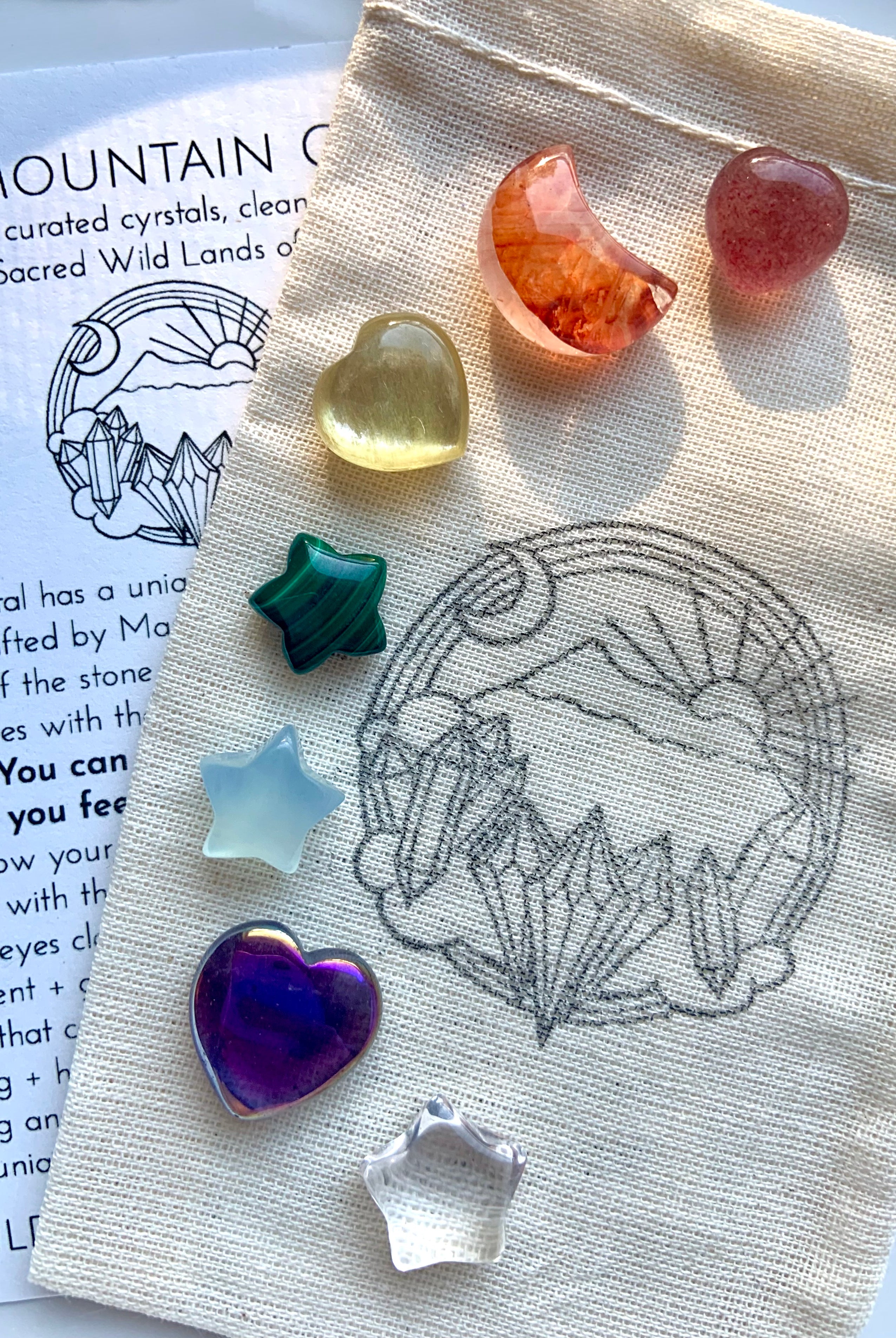 Premium chakra crystal set of 7 mini carved gems: heart, moon & star crystals in rainbow colors