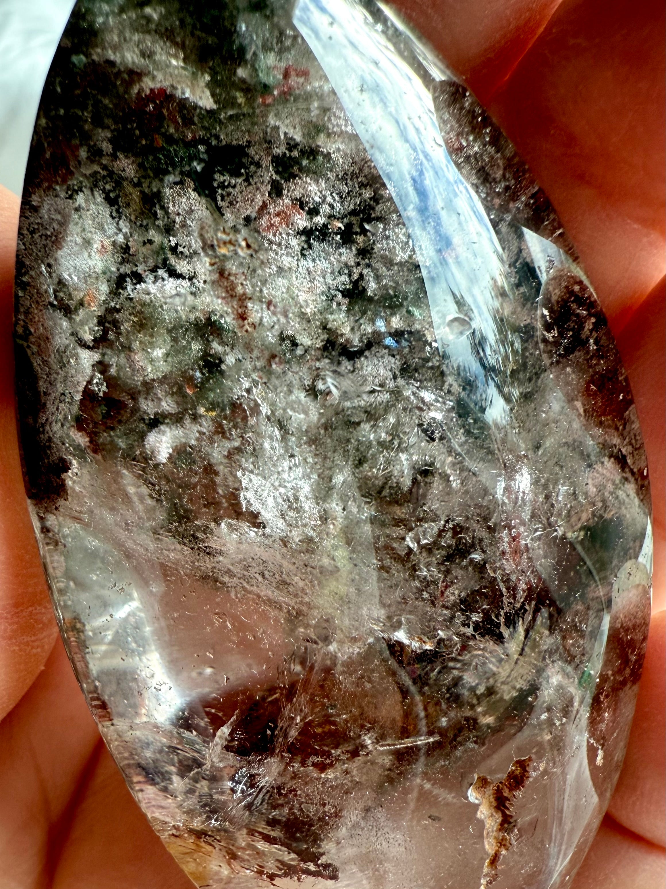 Close-up of Garden Quartz with detailed lodolite inclusions and shimmering golden healer within clear quartz