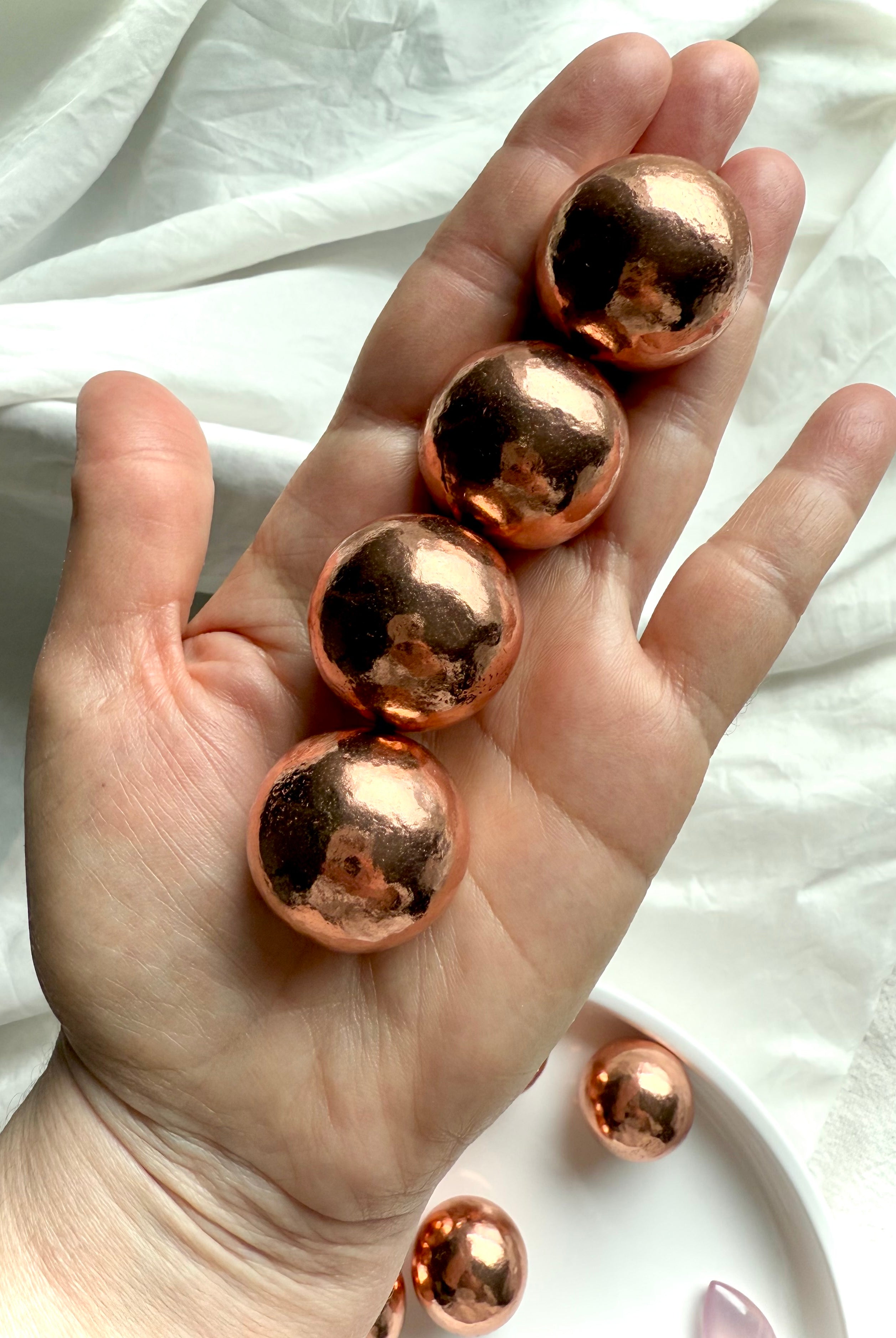 Michigan copper spheres shown on my hand for scale