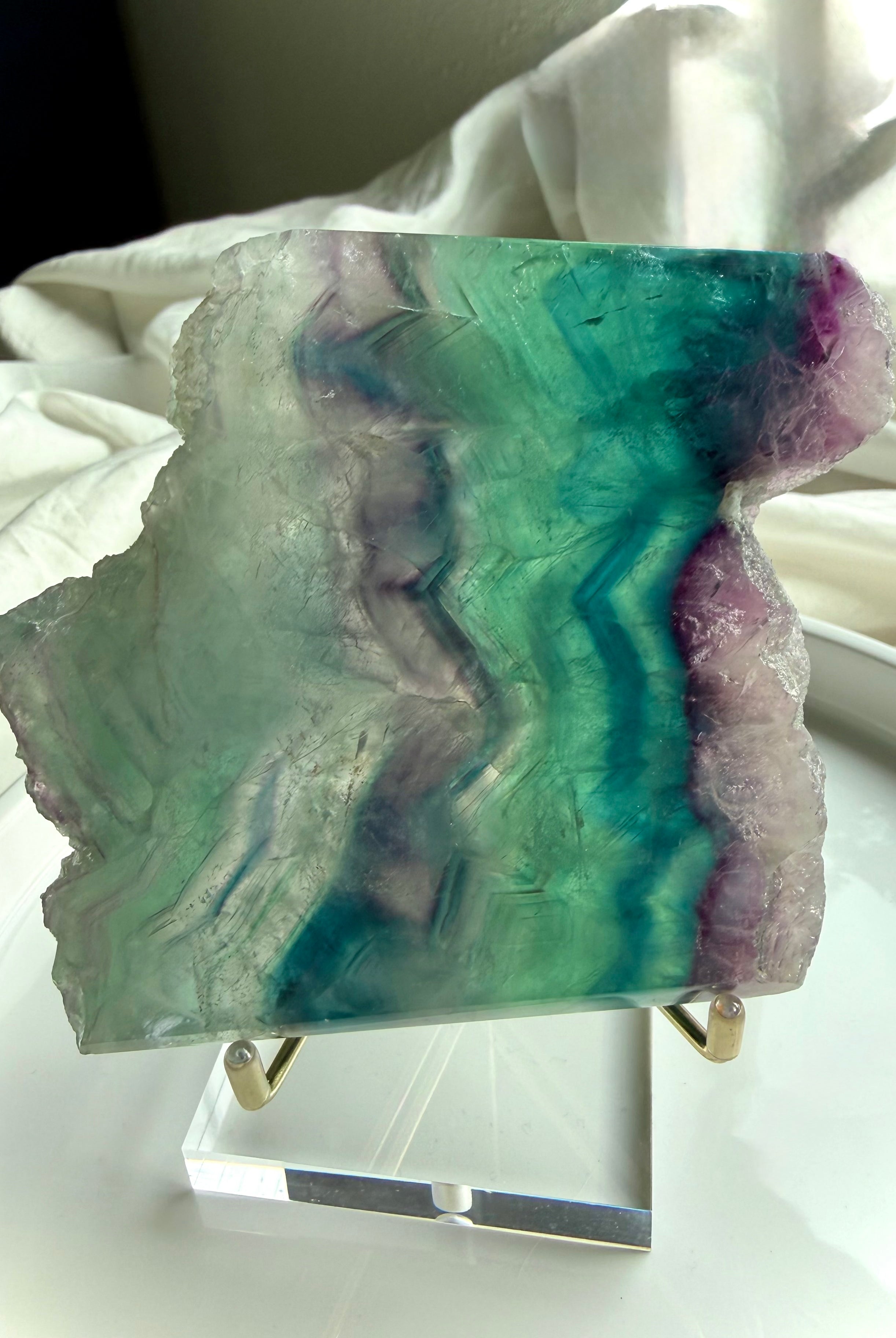 One of a kind fluorite slab shown on optional stand