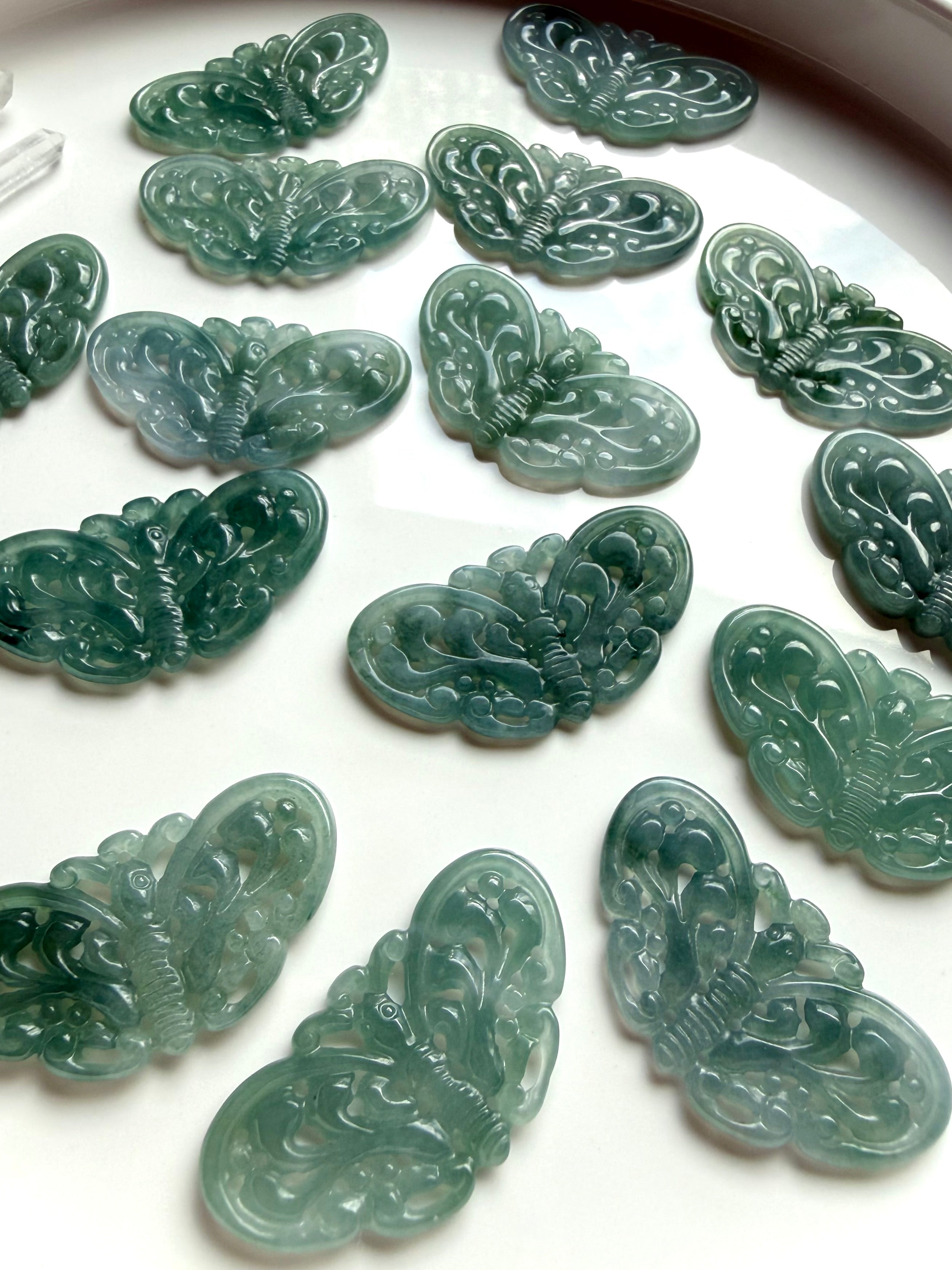 Blue Water Jade butterfly carvings in light, medium and dark teal jade from Guatemala