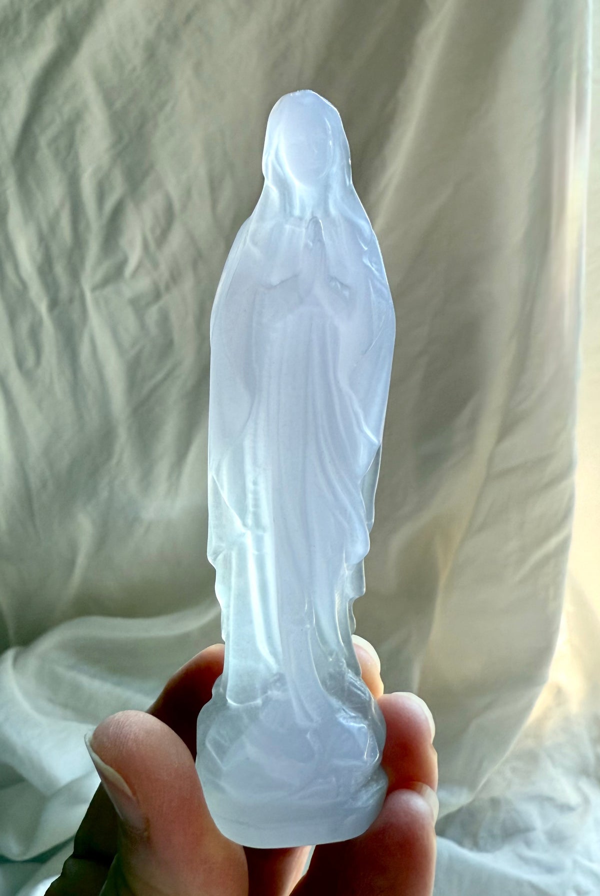 Lavender Fluorite Mother Mary crystal statue carved from luminous pale lavender and soft green Yttrium Fluorite