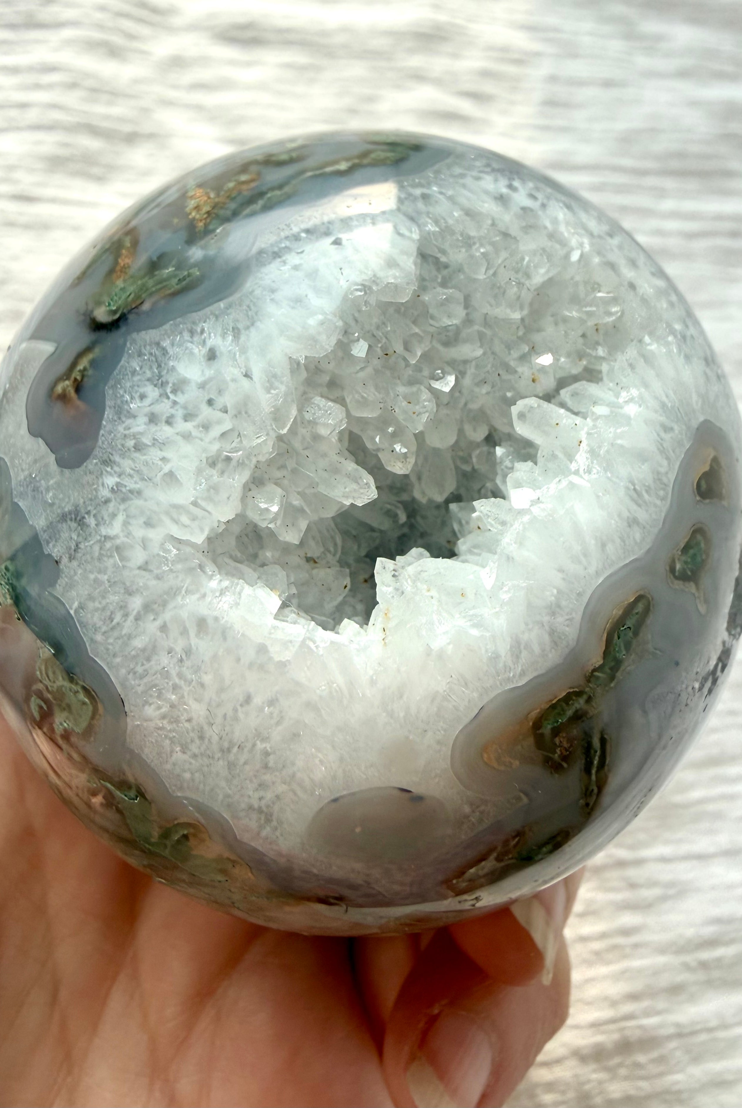 Quartz geode cave in Moss Agate sphere with sparkling crystal points, white Quartz and delicate gray chalcedony banding