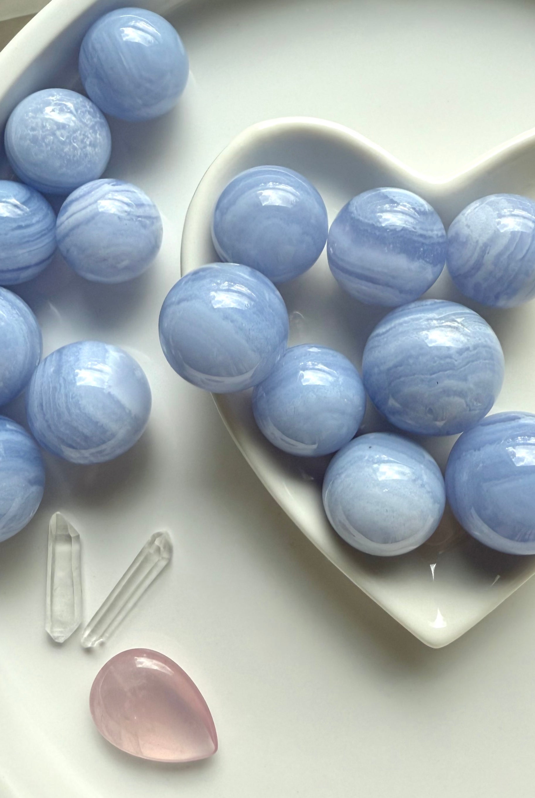 Mini Blue Lace Agate Spheres bring relaxation, peace + tranquility, opening the throat chakra.