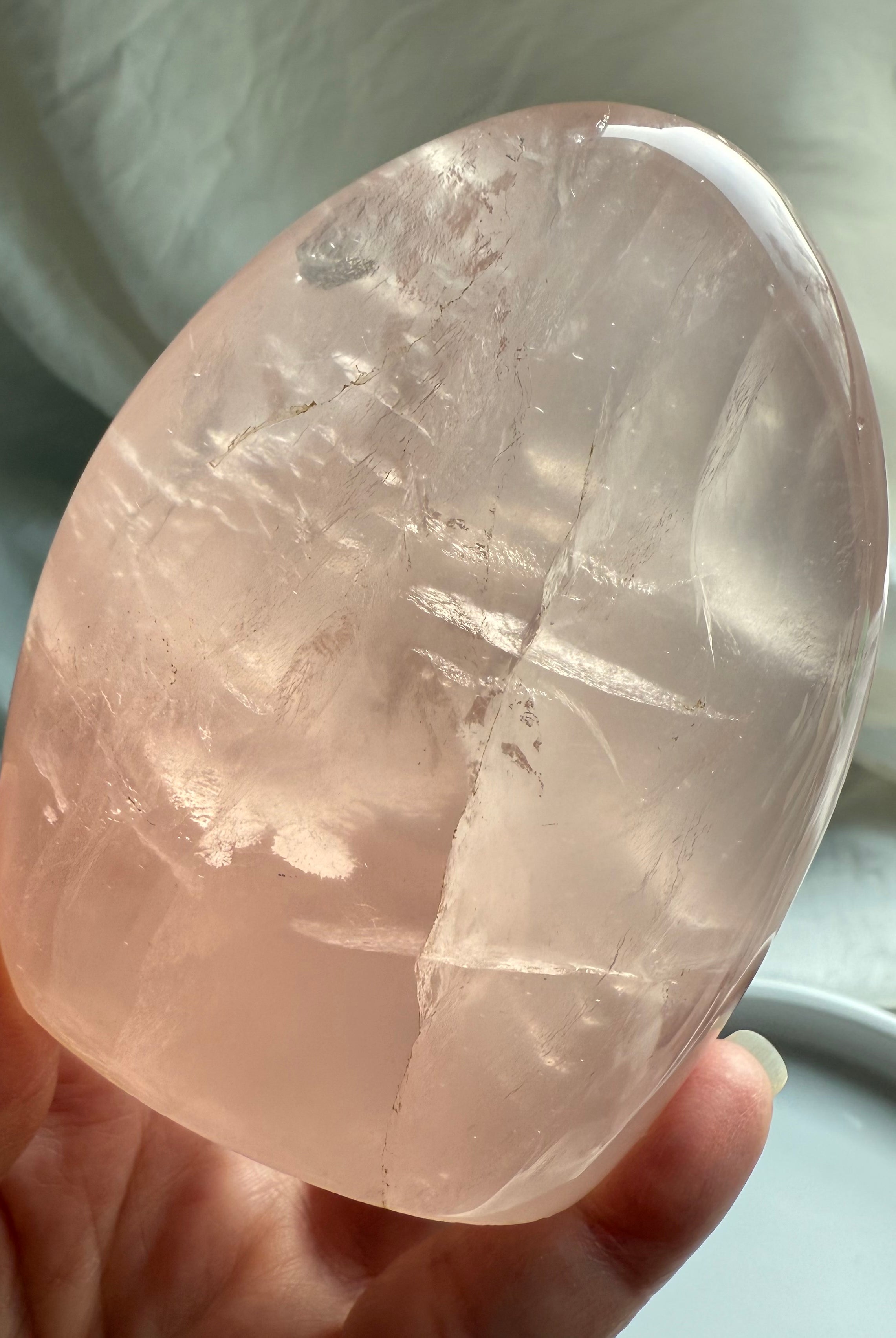 Rose Quartz freeform with soft pink translucence and subtle star-like asterism in natural light