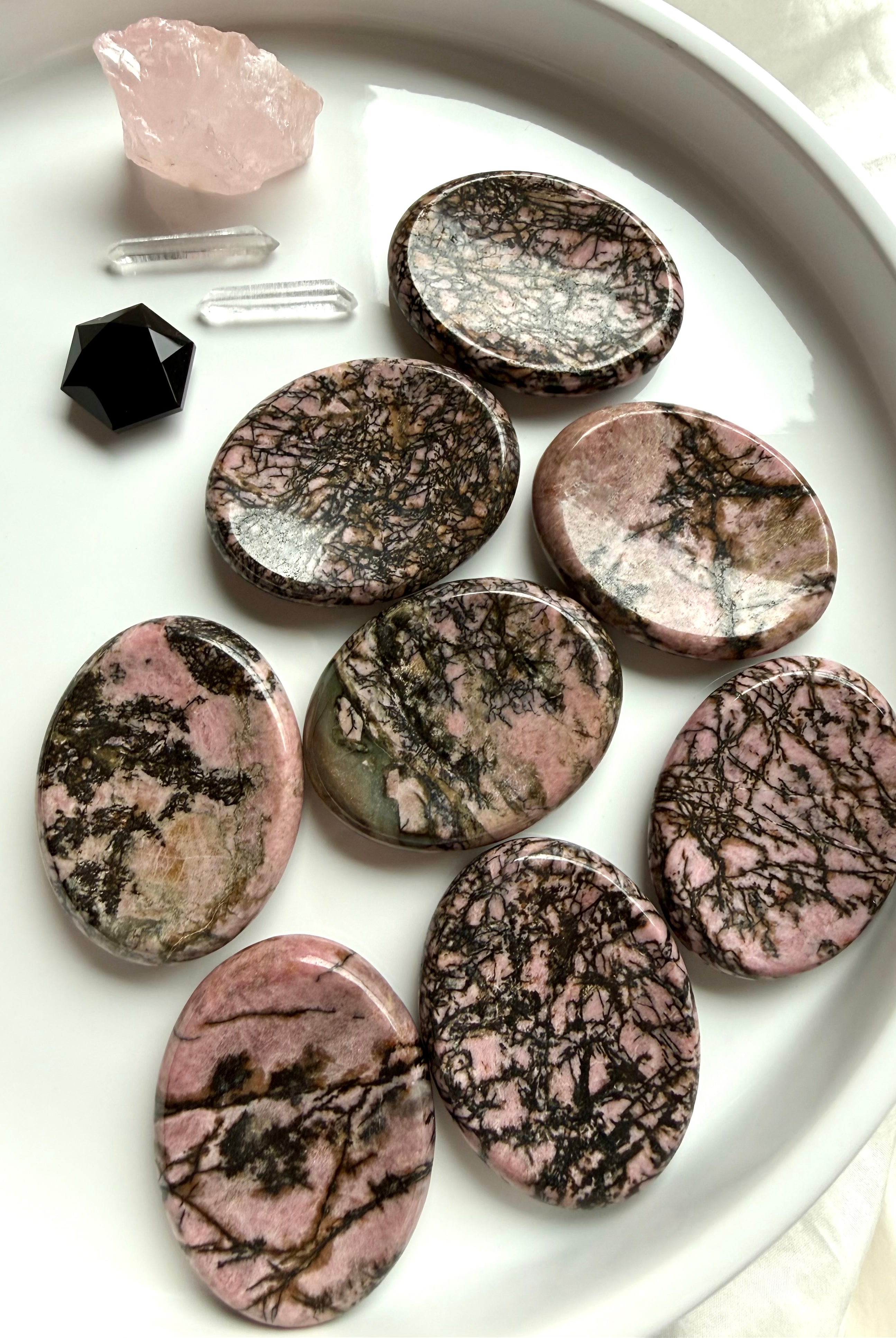 Natural Rhodonite worry stones with pink and black manganese matrix for Heart Chakra healing