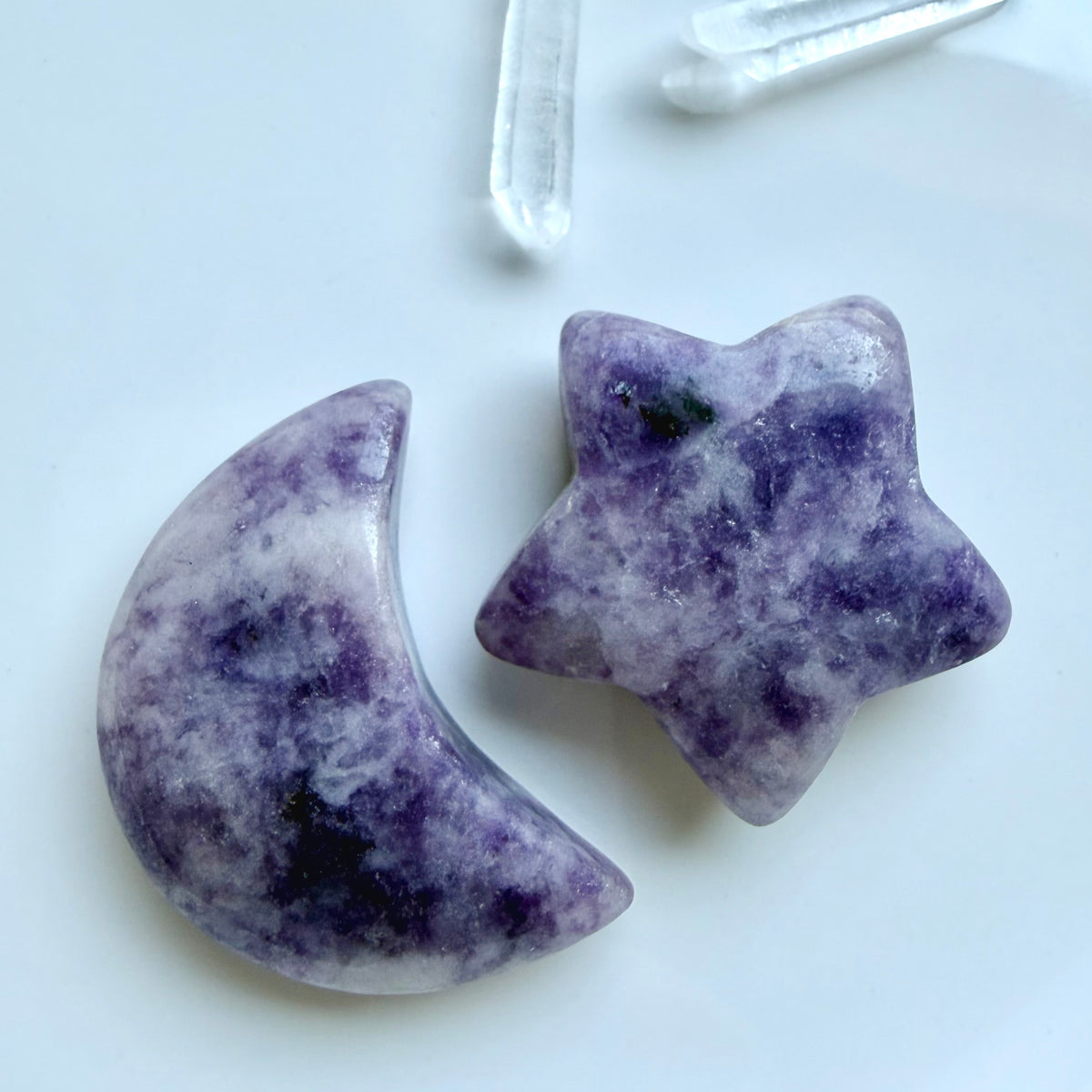 Polished Lepidolite crescent moon and star crystals with natural lavender and purple mineral patterning