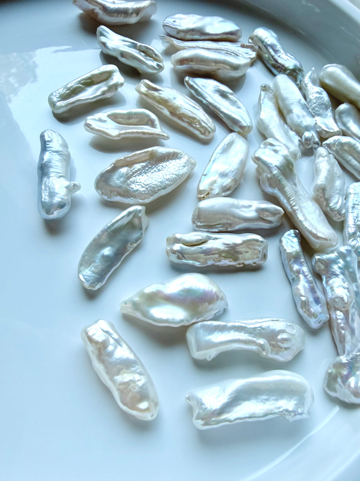 Baroque freshwater stick pearls with high-luster nacre and naturally unique elongated shapes