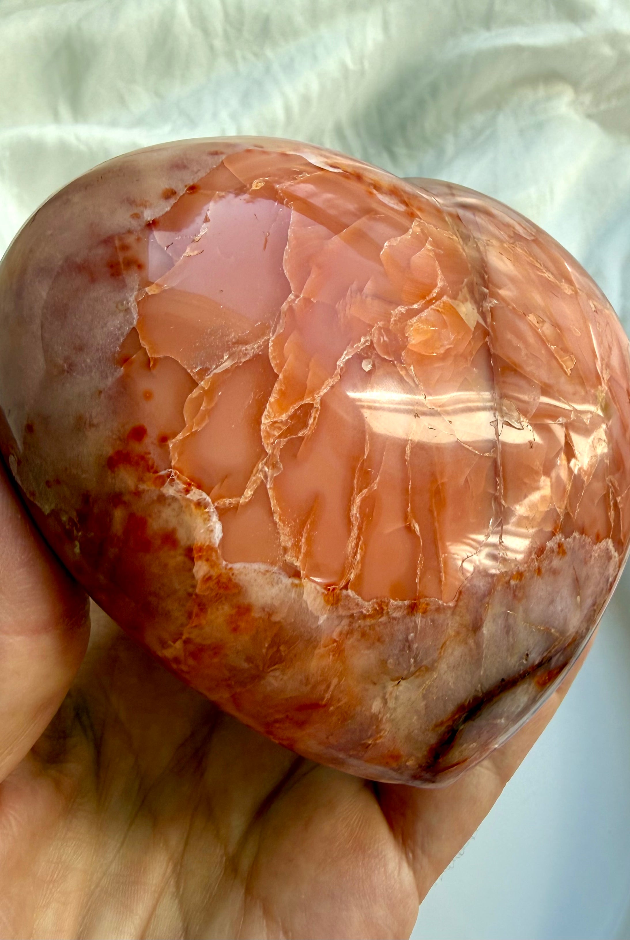 Back of one of a kind Carnelian geode heart with natural banding and polished finish