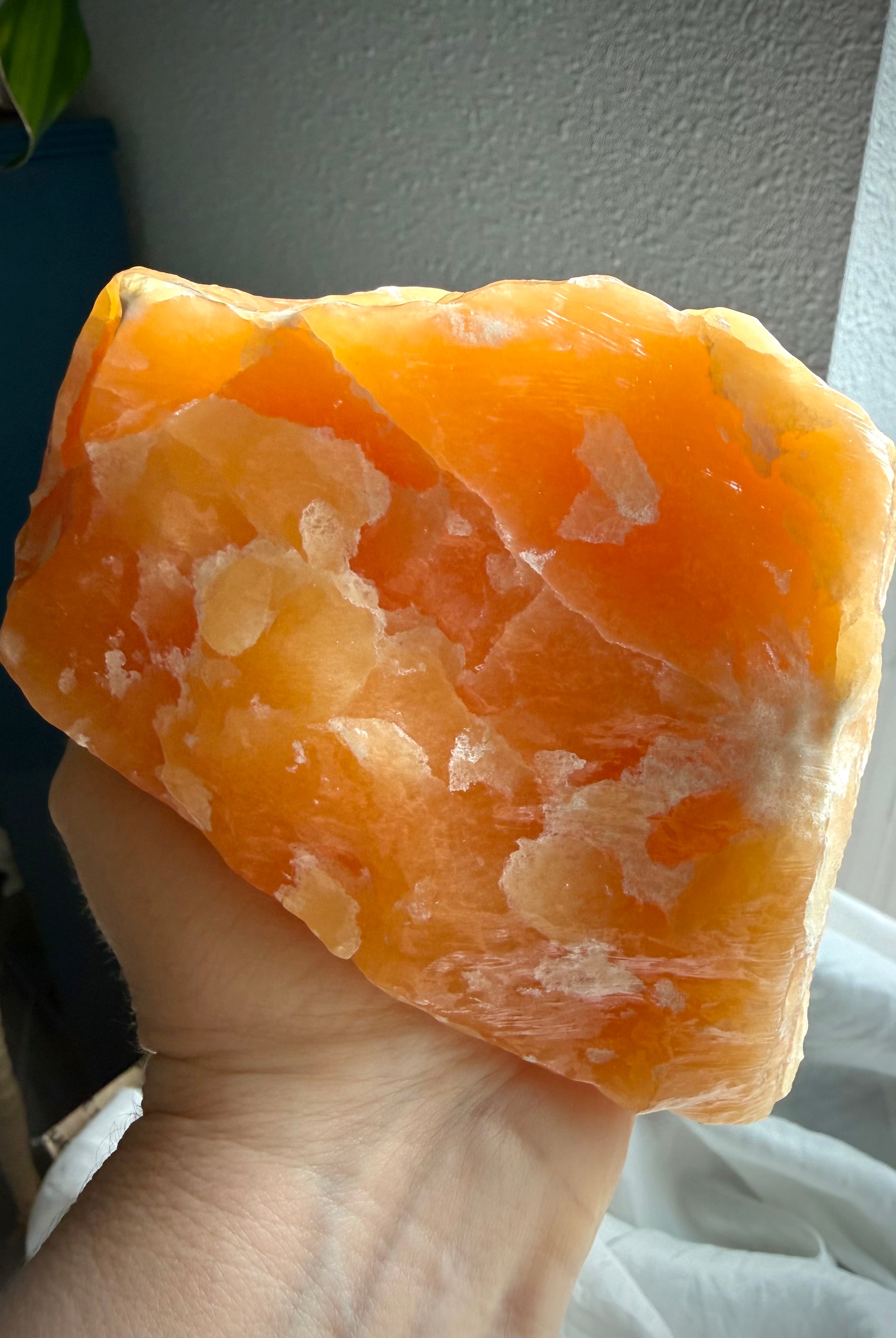 Large self-standing Orange Calcite crystal with bold natural formations and rich honey-orange coloration