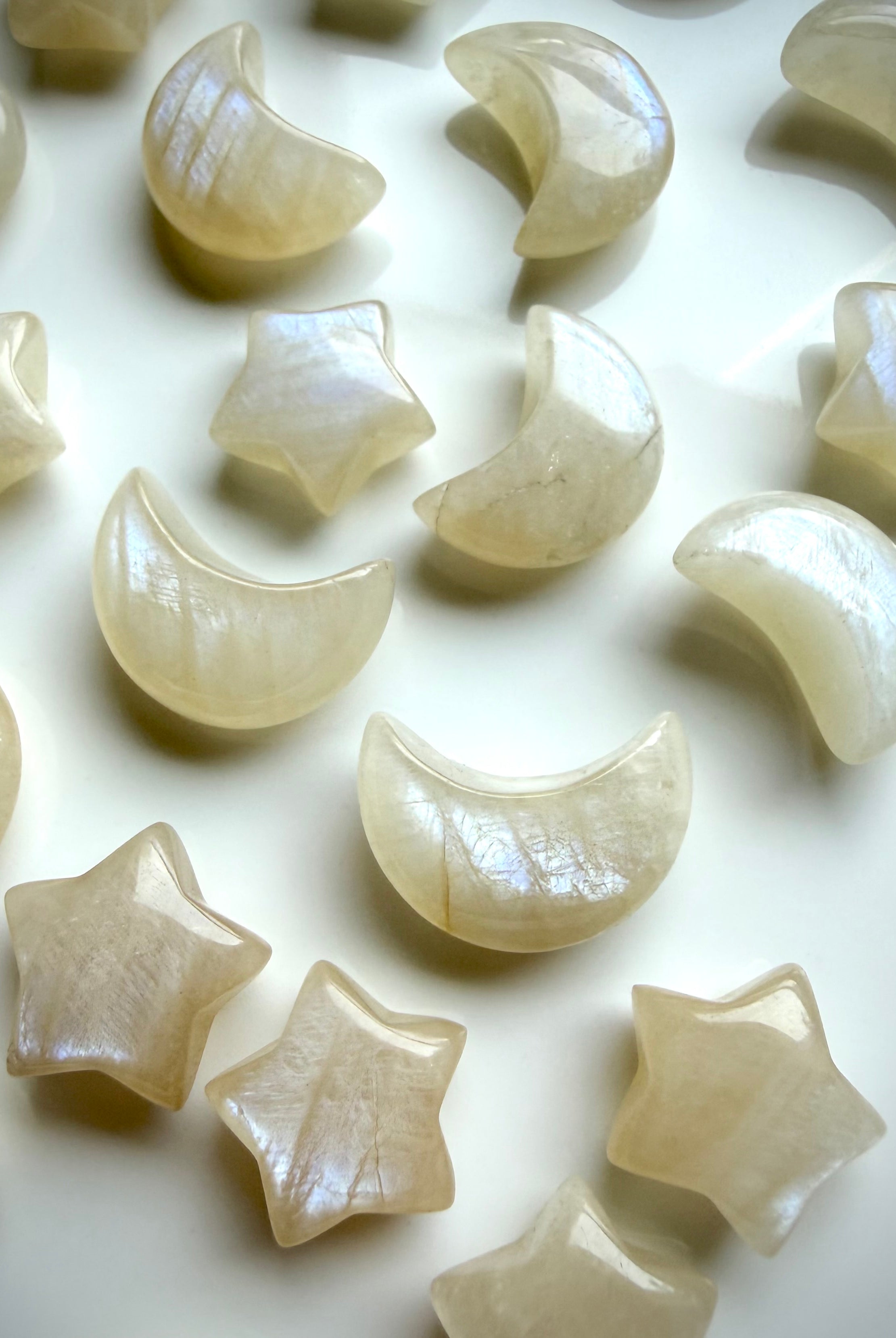 Mini Moonstone moon and star carvings with beautiful blue-white flash and natural feldspar texture