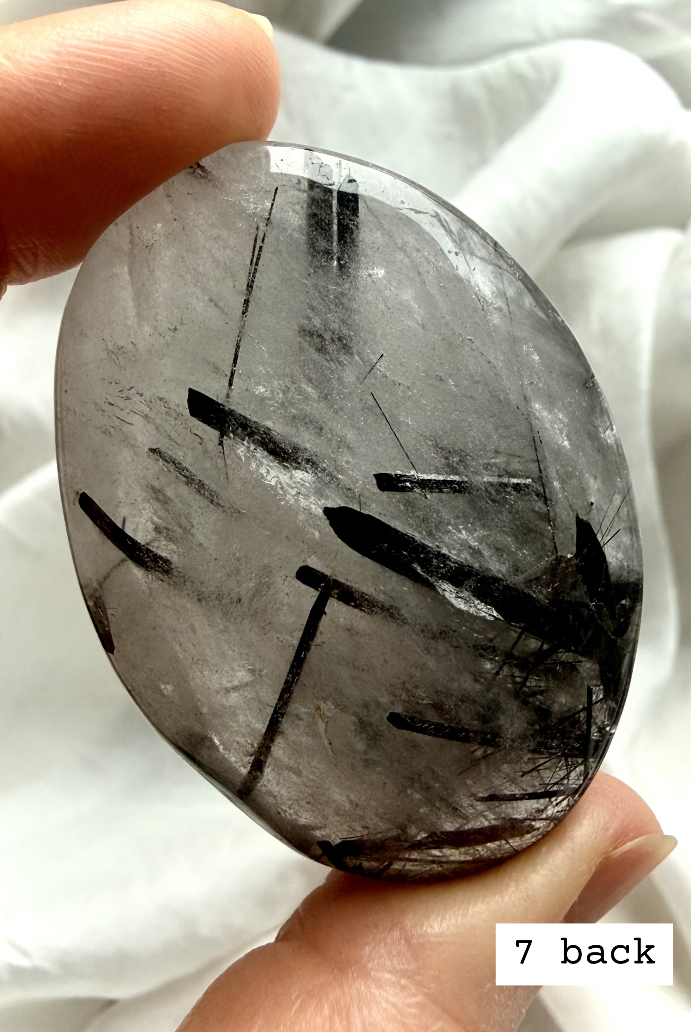 Black Tourmaline in Quartz palm stone 7 back view showing tourmaline needle inclusions