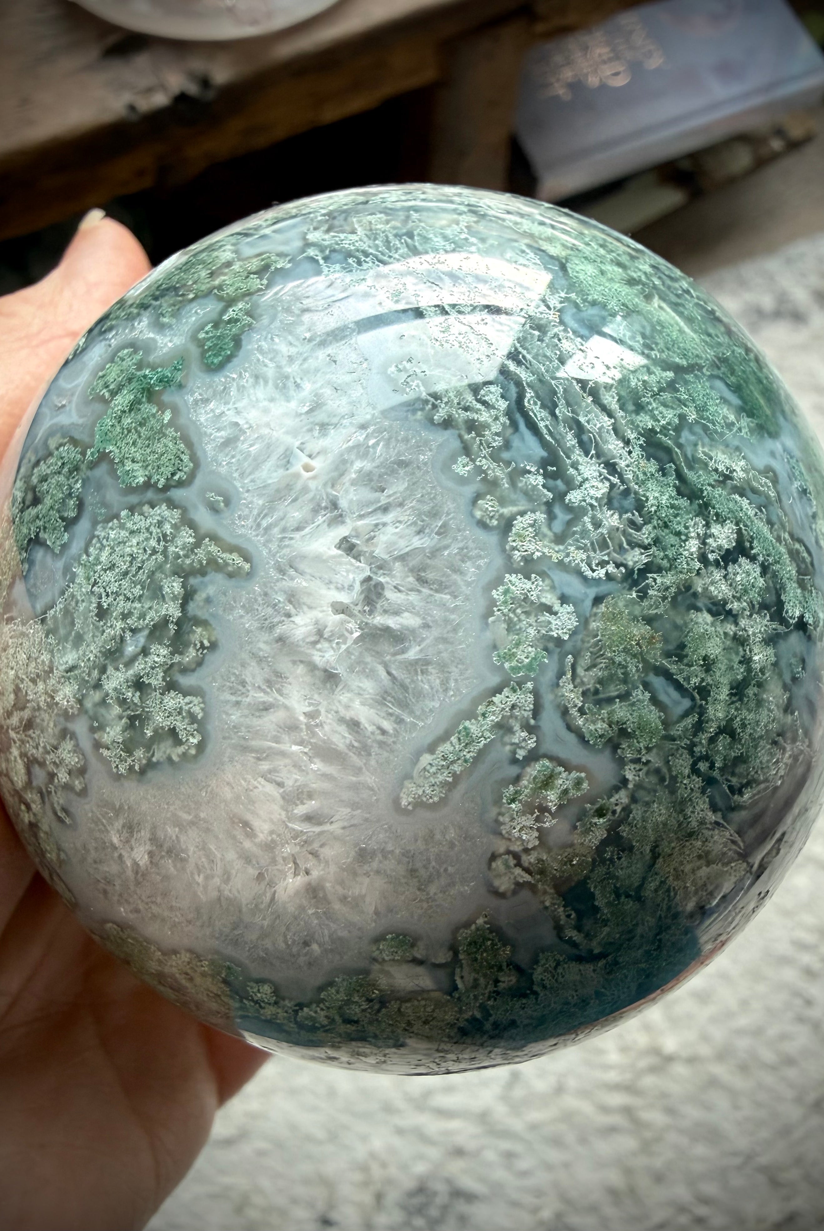 One of a kind Moss Agate sphere with lacy green patterns, white Quartz areas, and natural stone formations