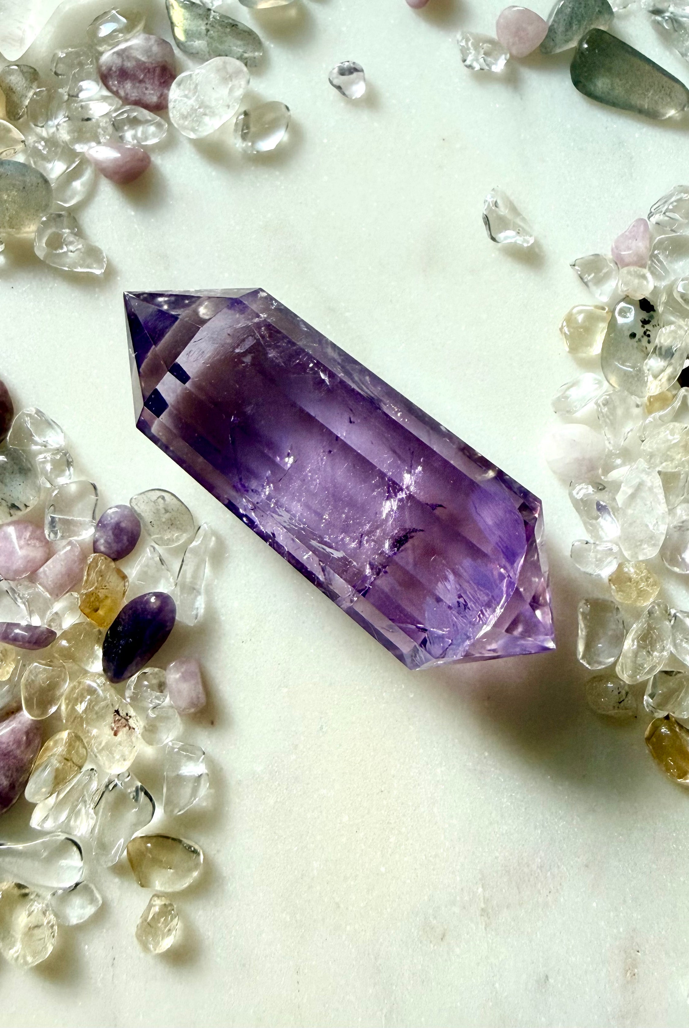 Double terminated 12-sided Amethyst Vogel crystal surrounded by Clear Quartz and gemstone chips