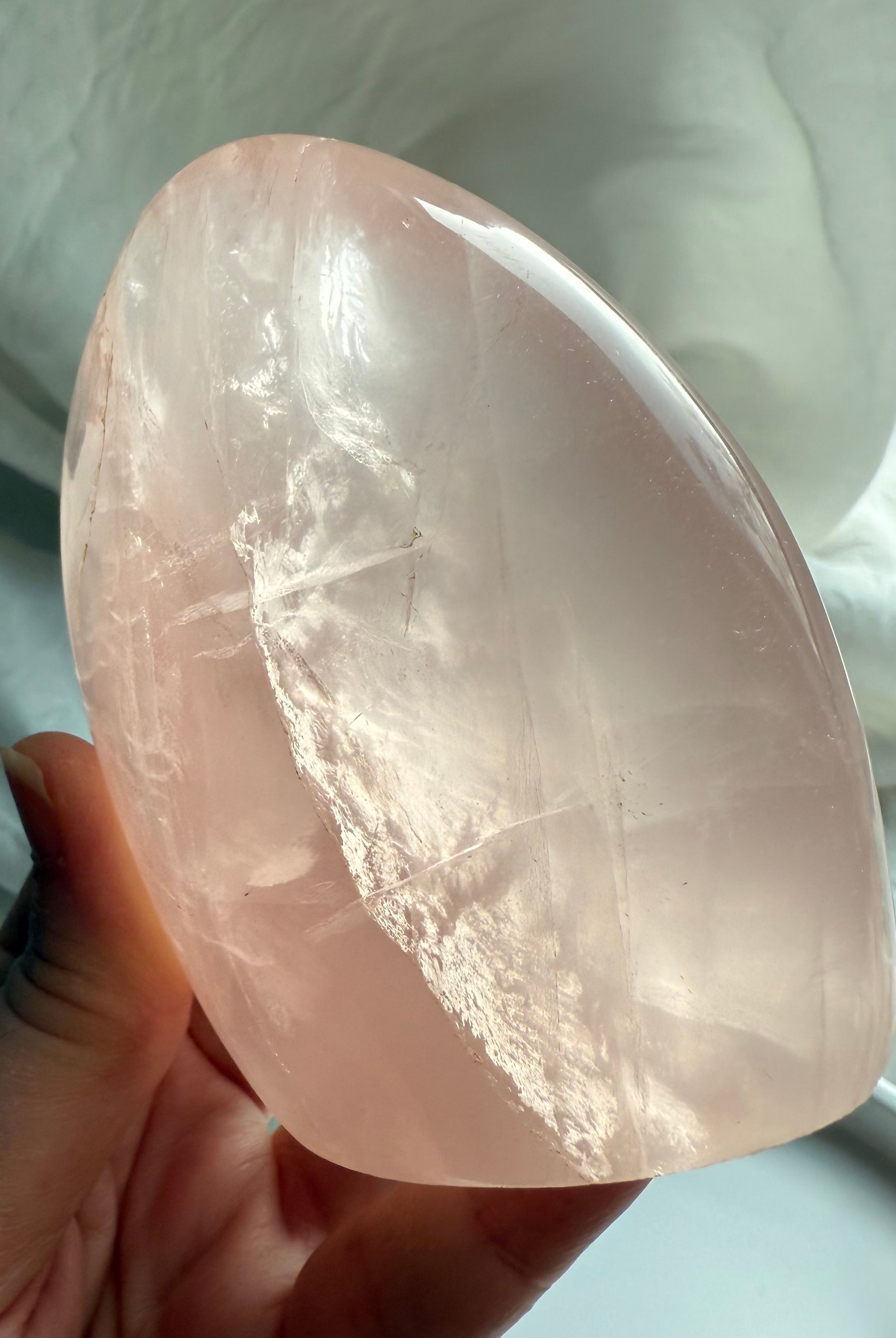 High-quality Rose Quartz freeform with soft feminine energy and subtle cat’s eye asterism effect