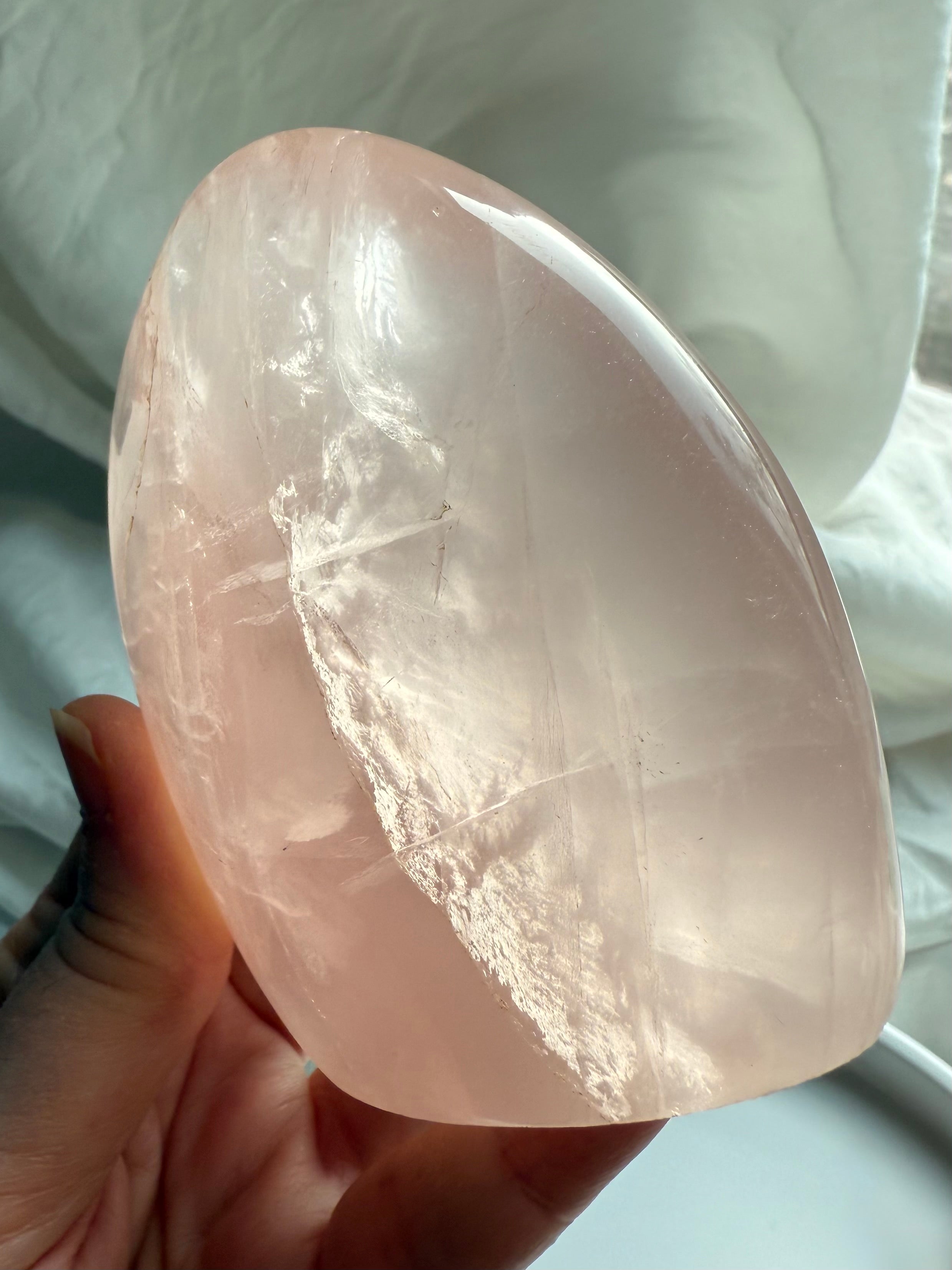 High-quality Rose Quartz freeform with soft feminine energy and subtle cat’s eye asterism effect