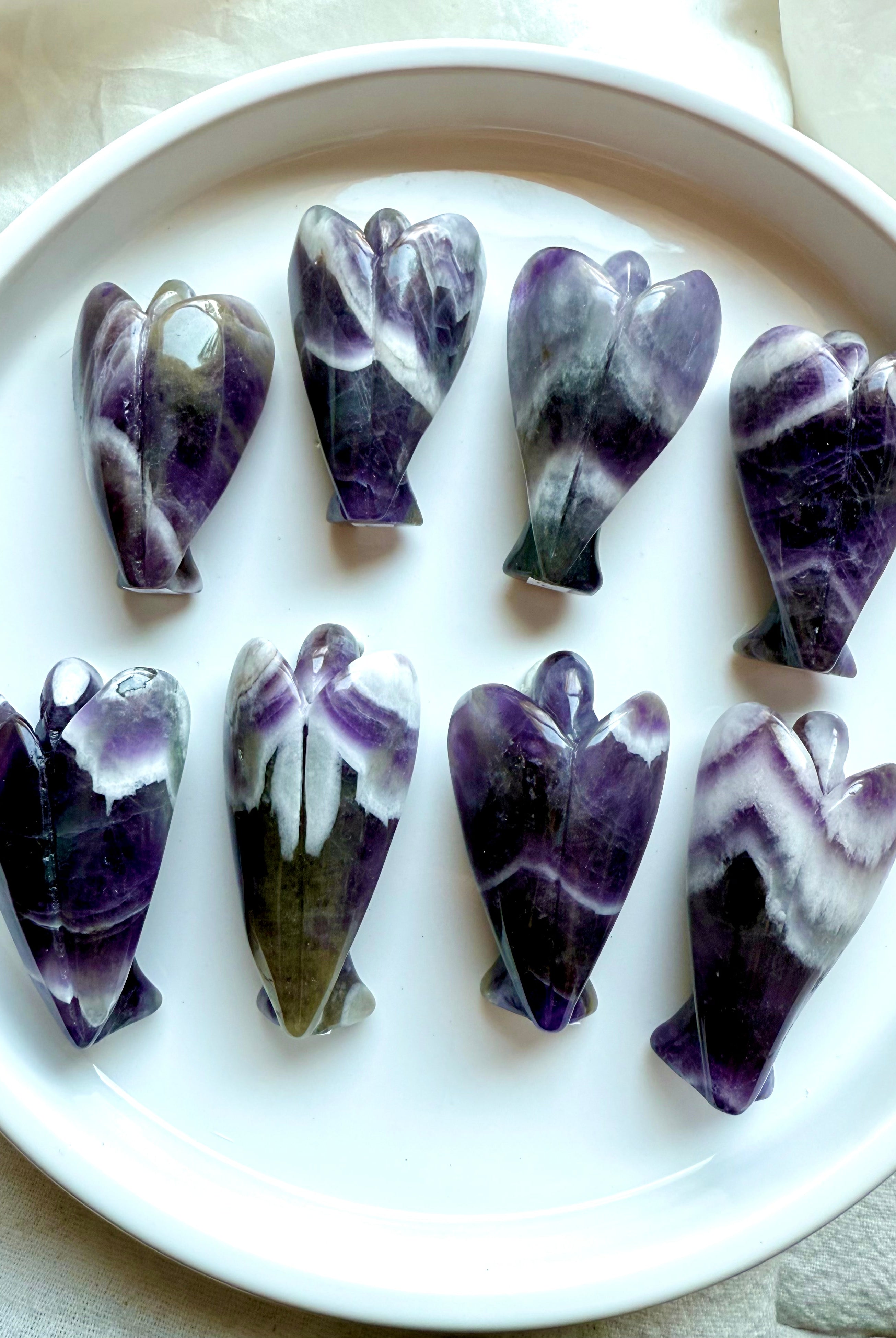 Chevron Amethyst angel carvings back view – unique white and purple patterns in Dream Amethyst angels