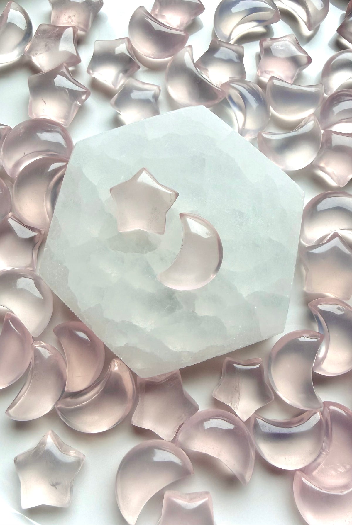 Mini Rose Quartz moons and stars with soft translucent pink color, crystals for love, emotional healing and Heart Chakra energy