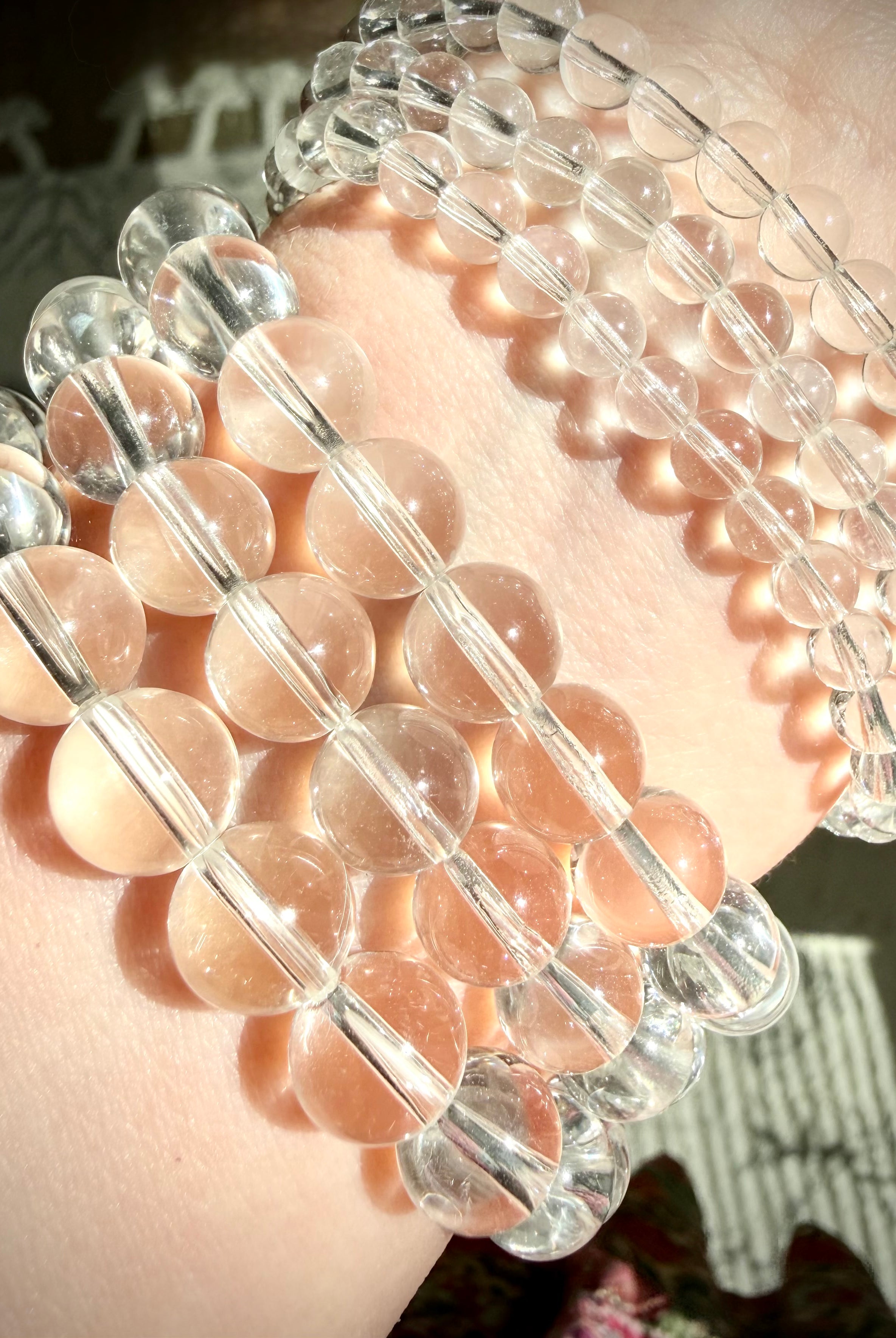 High clarity Clear Quartz bracelets displayed on wrist with natural transparent crystal beads