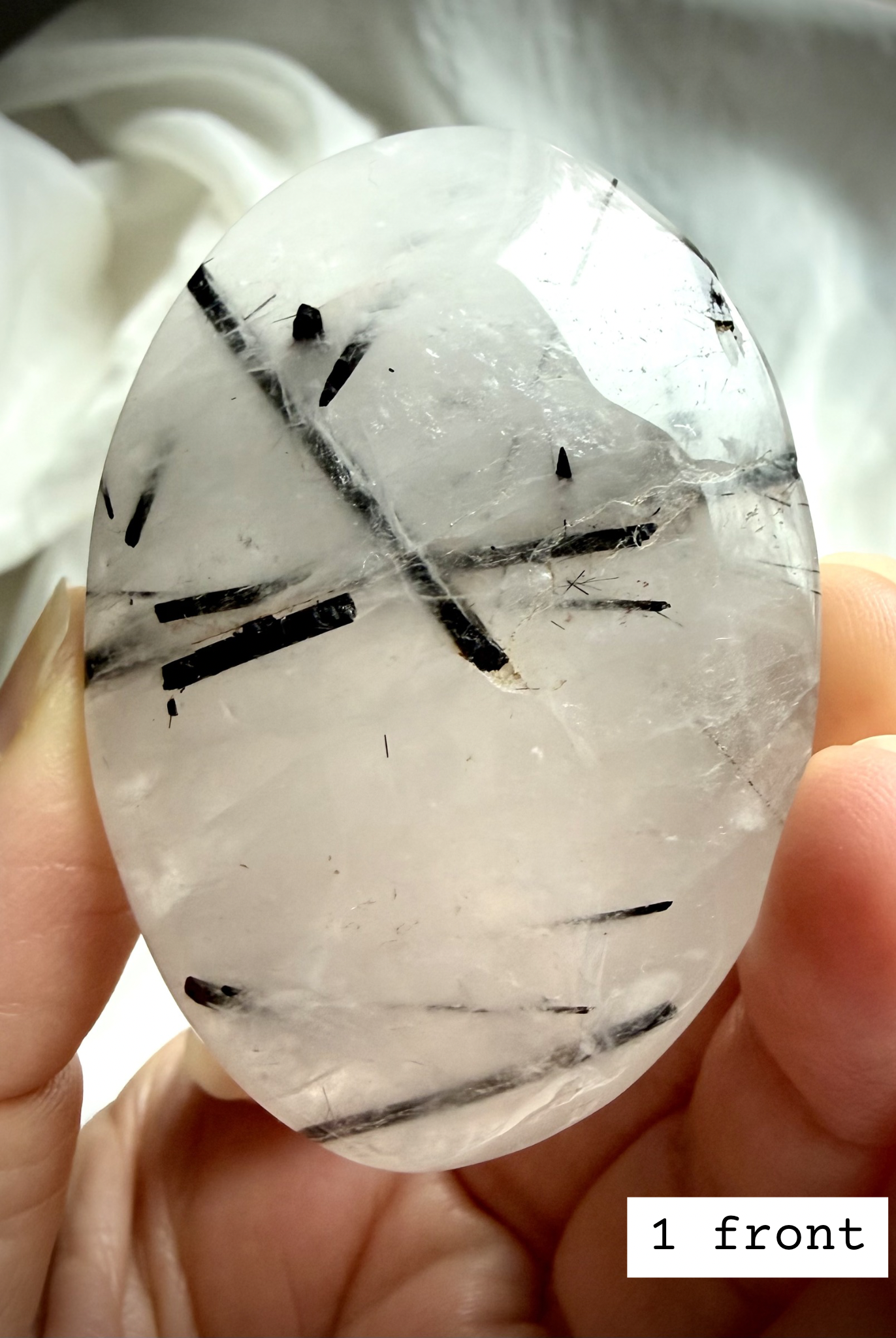 Black Tourmaline in Quartz palm stone 1 front view Tourmalinated Quartz protection crystal