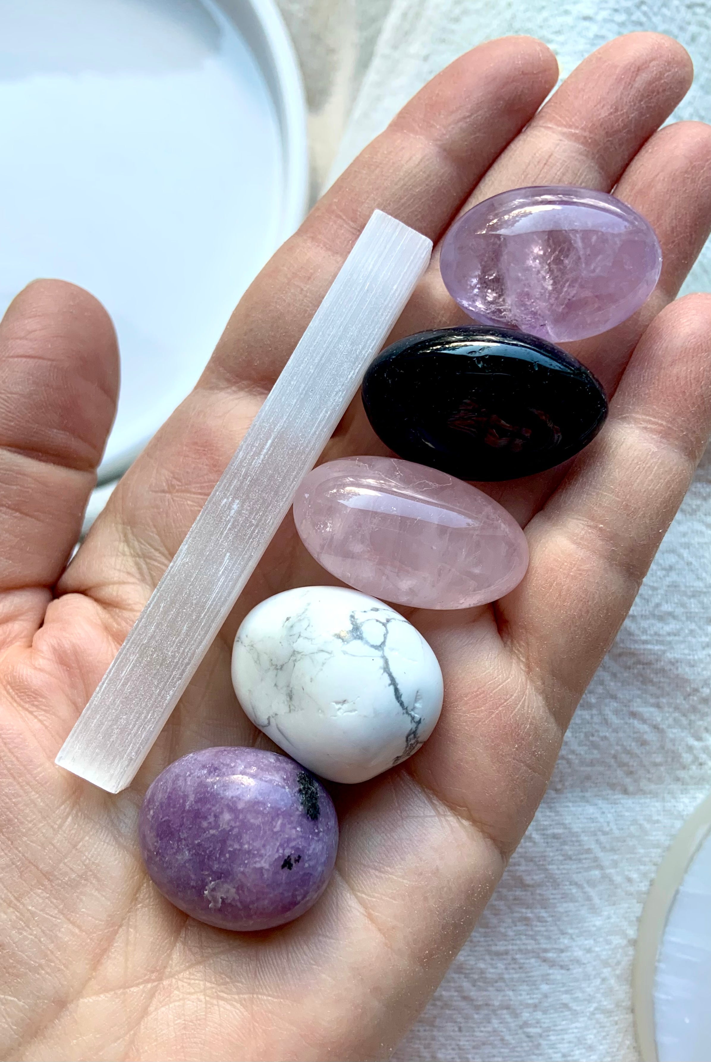 The Sweet Sleep Crystal Set to help you relax at bedtime, shown on my hand for scale