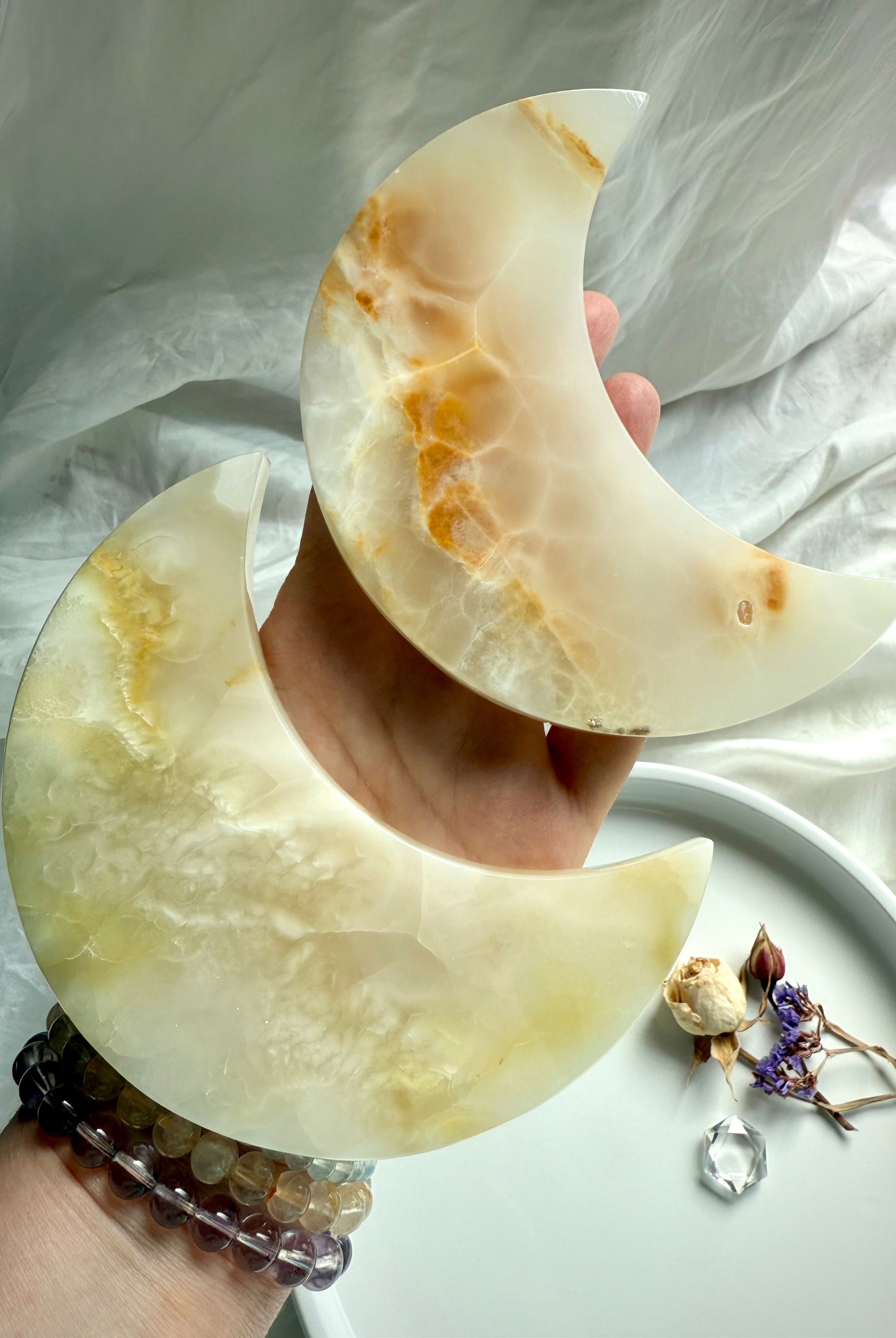 White Onyx Crescent Moon Plates with golden honey veining – crystal moon carvings for energy work, jewelry display, and spiritual decor