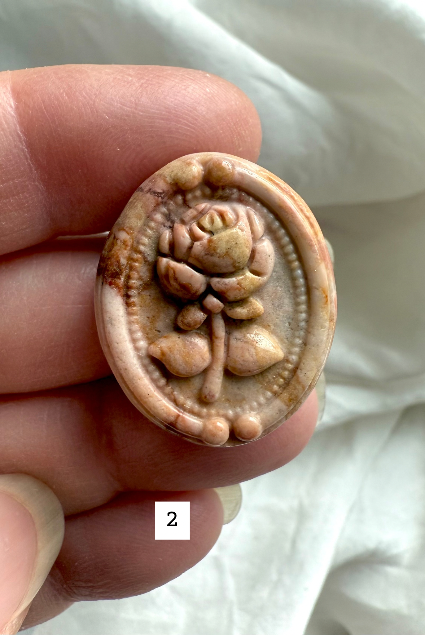 Polychrome Jasper Rose carving #2 close-up with warm beige and soft blush tones