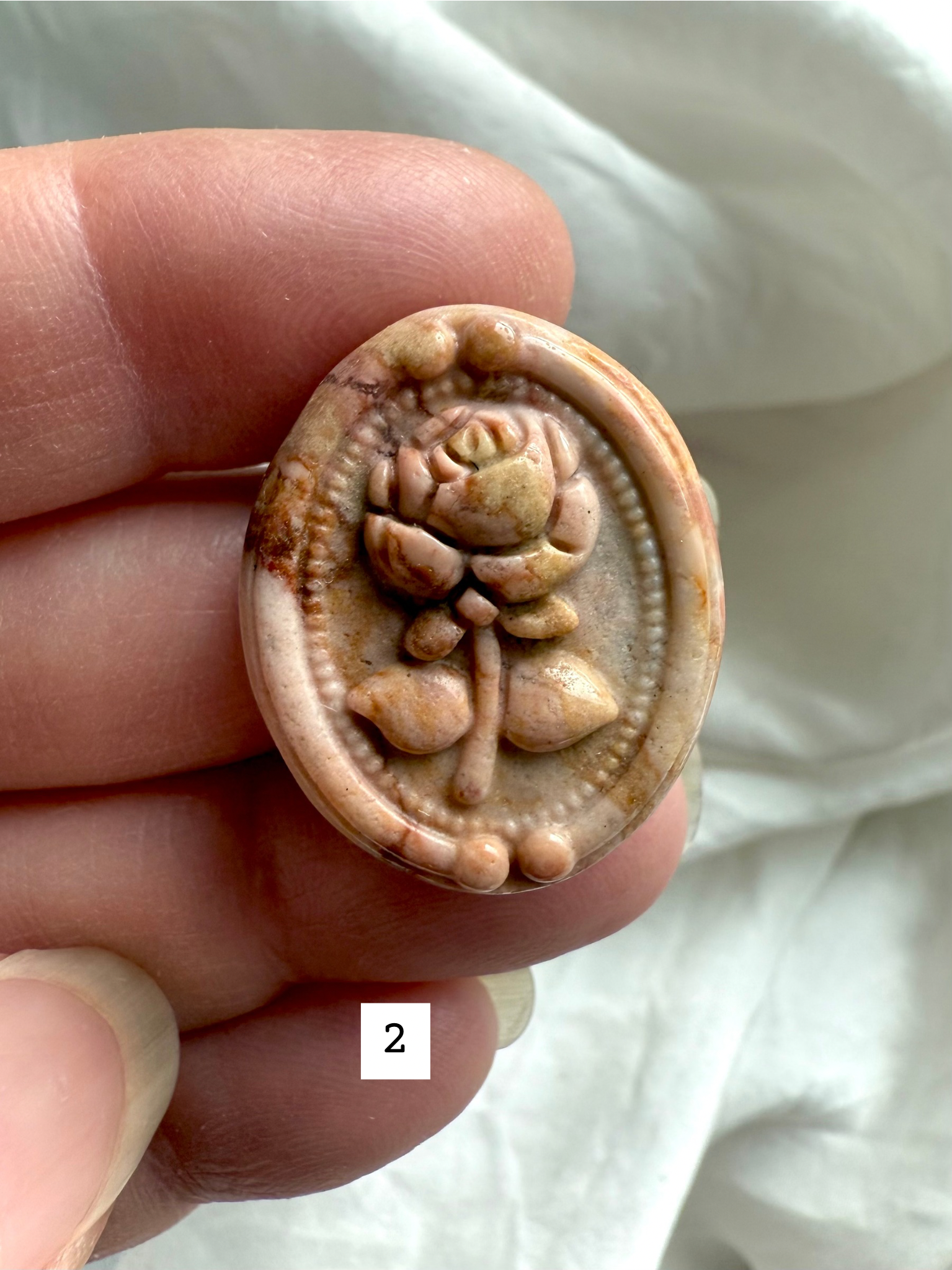 Polychrome Jasper Rose carving #2 close-up with warm beige and soft blush tones