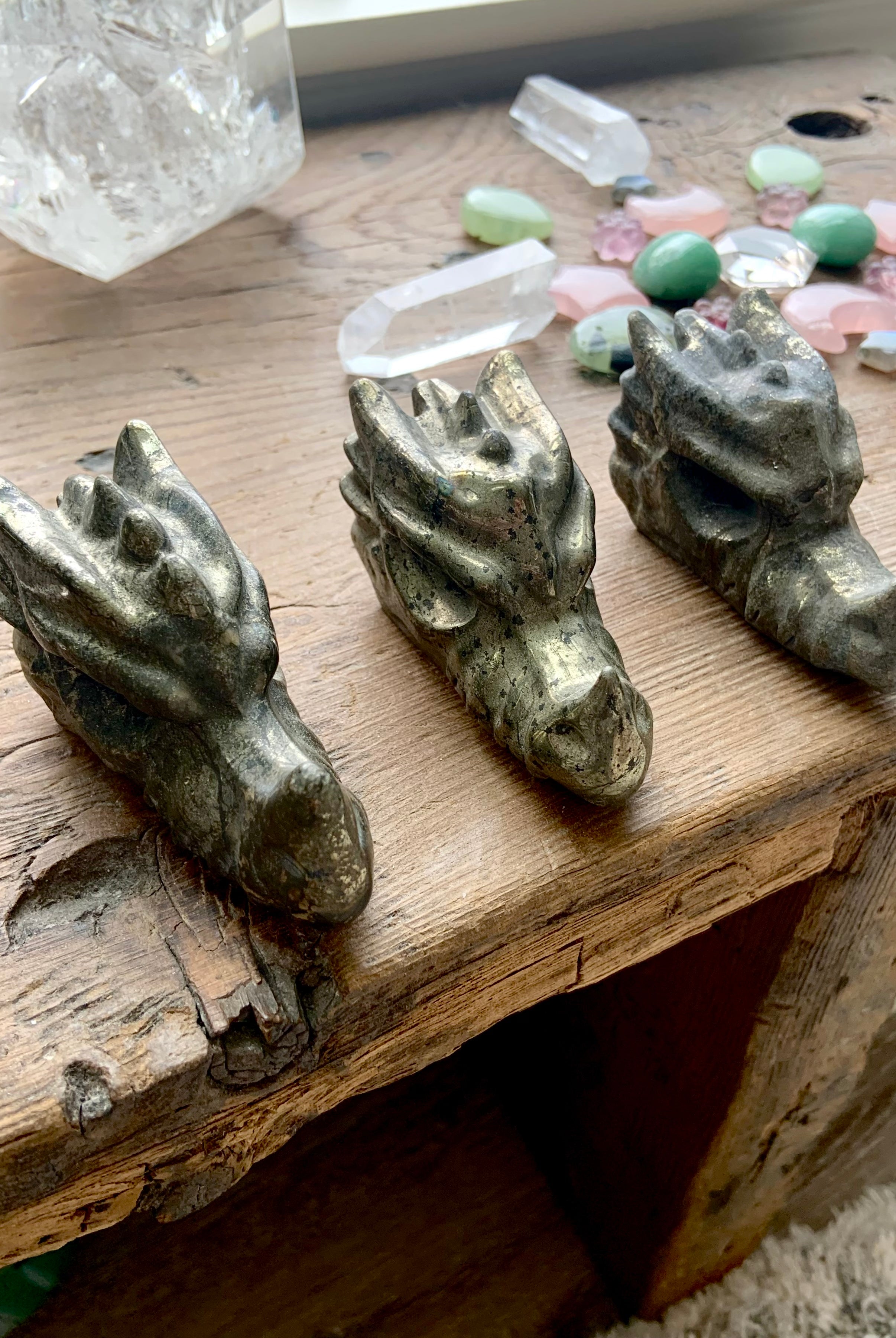 Intuitively chosen pyrite crystal dragons, hand-carved guardian figures for confidence and manifestation