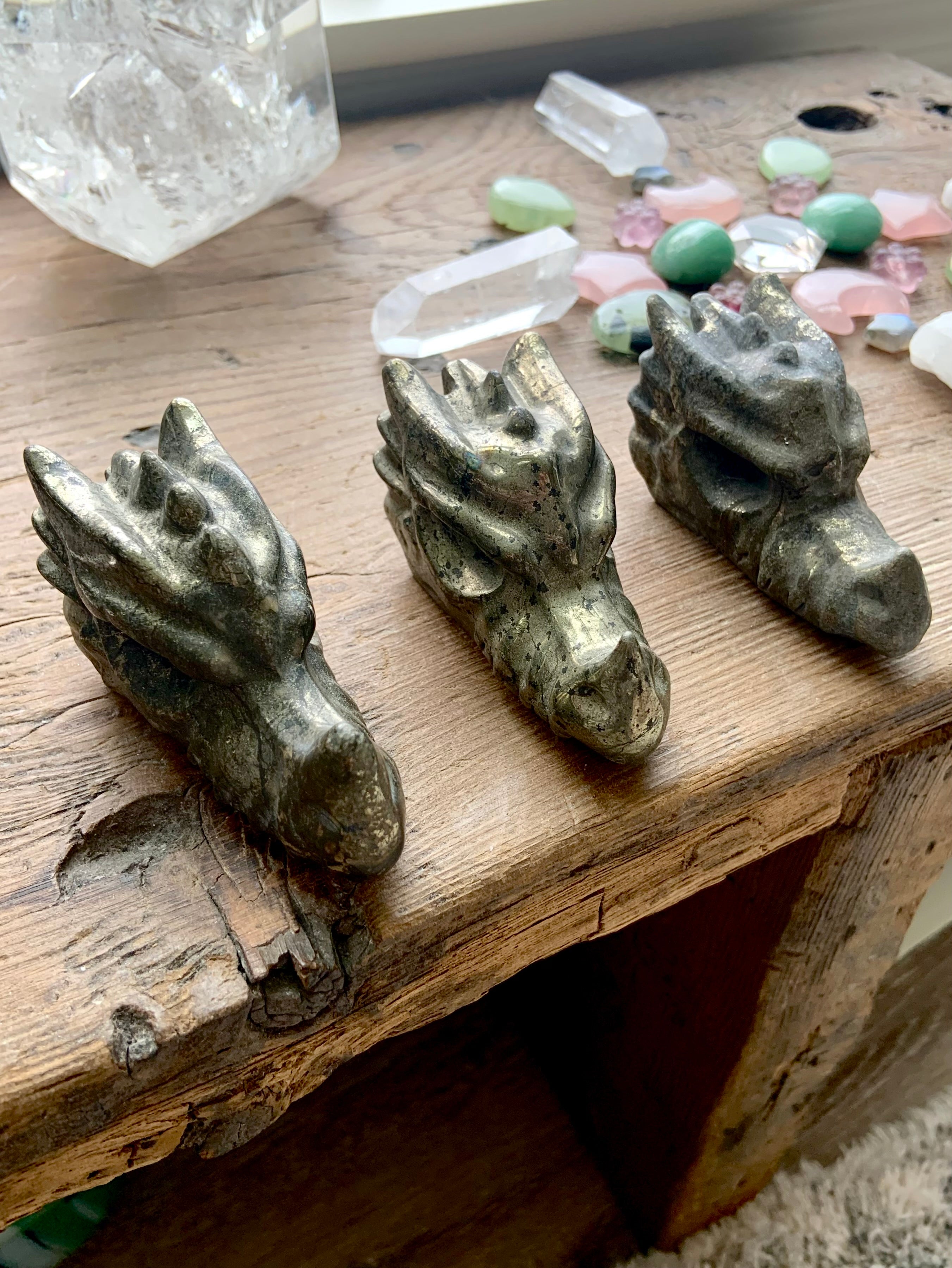 Intuitively chosen pyrite crystal dragons, hand-carved guardian figures for confidence and manifestation