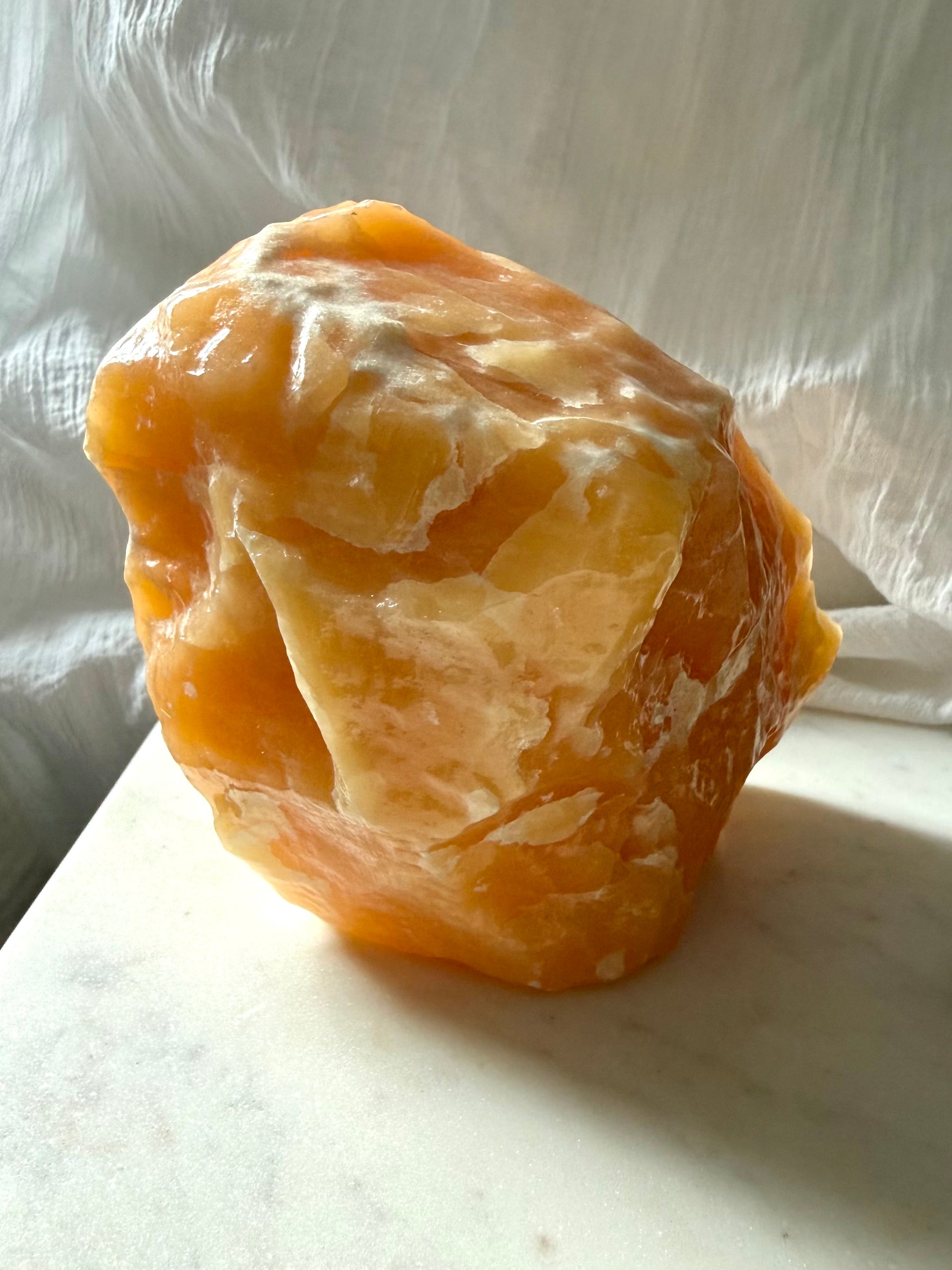 Large Orange Calcite statement piece from Mexico with rich orange color and dramatic natural mineral formations