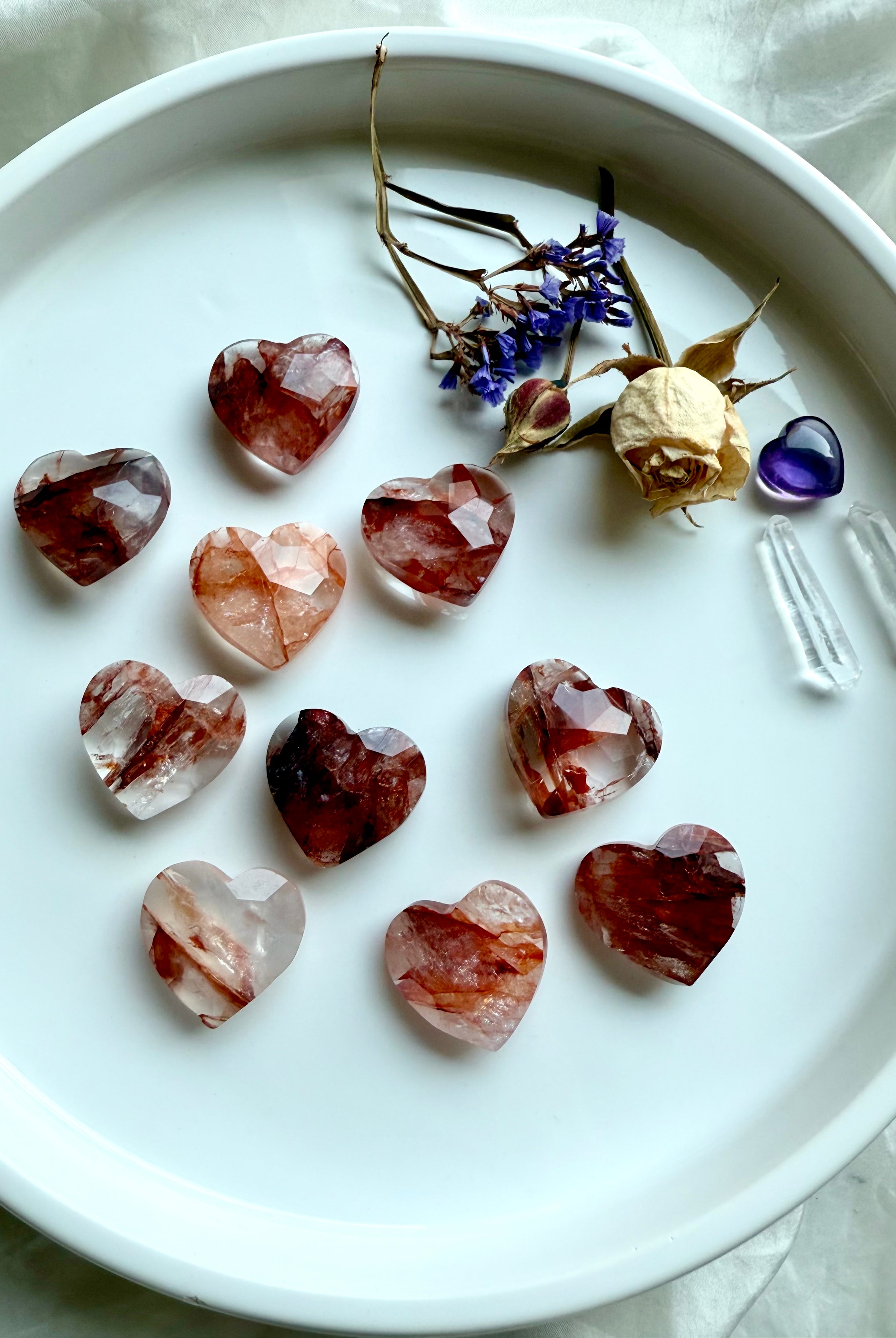 Mini Fire Quartz faceted heart styled with amethyst, quartz points, and flowers – sacral chakra healing crystals
